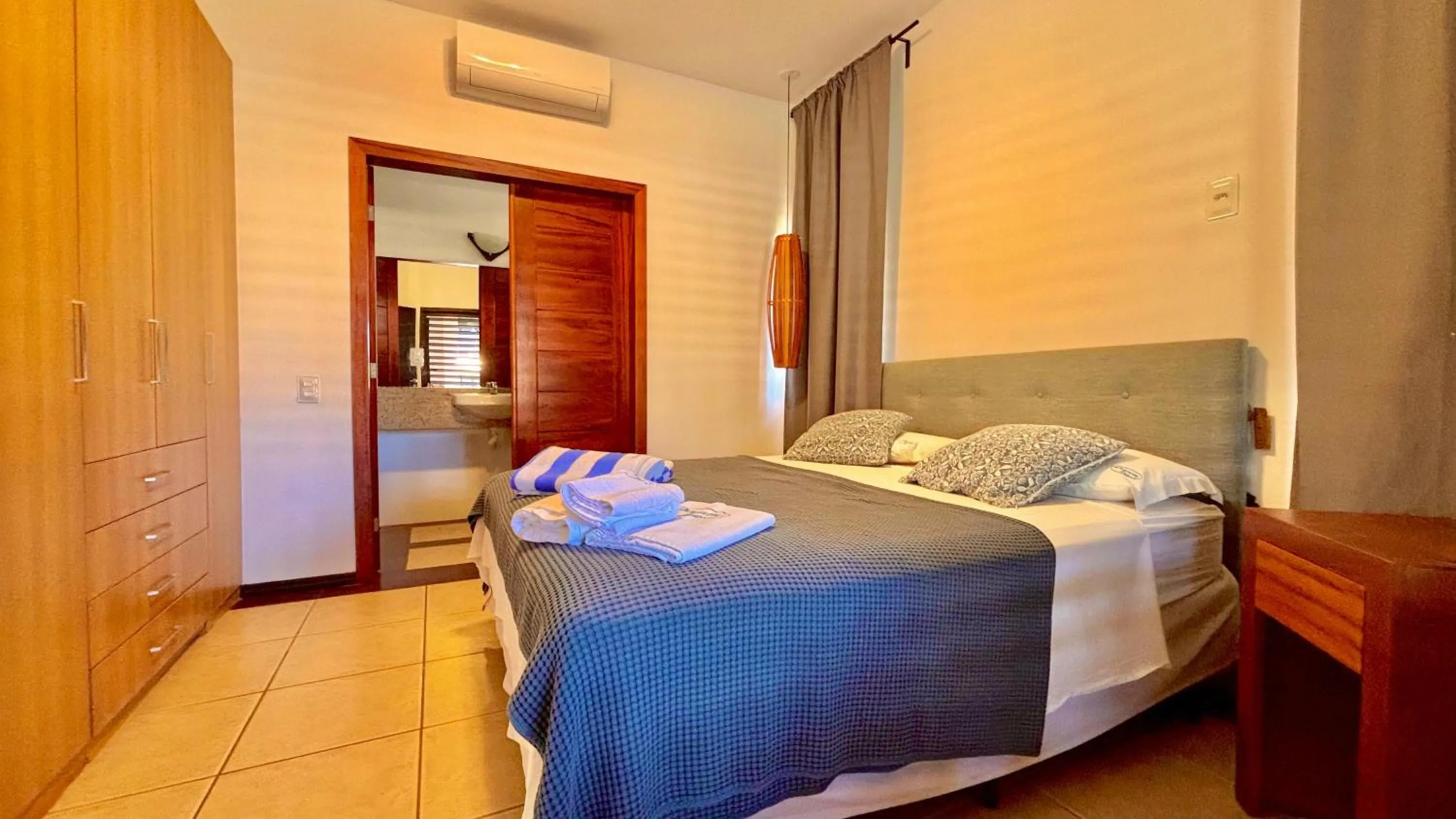 Bed in Dream Beach Cumbuco Oceanfront Apartments