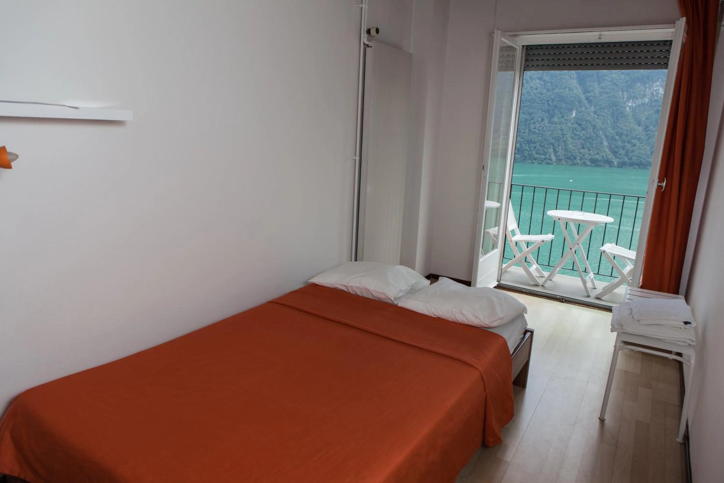 Photo of the whole room, Bed in Ristorante le bucce di Gandria