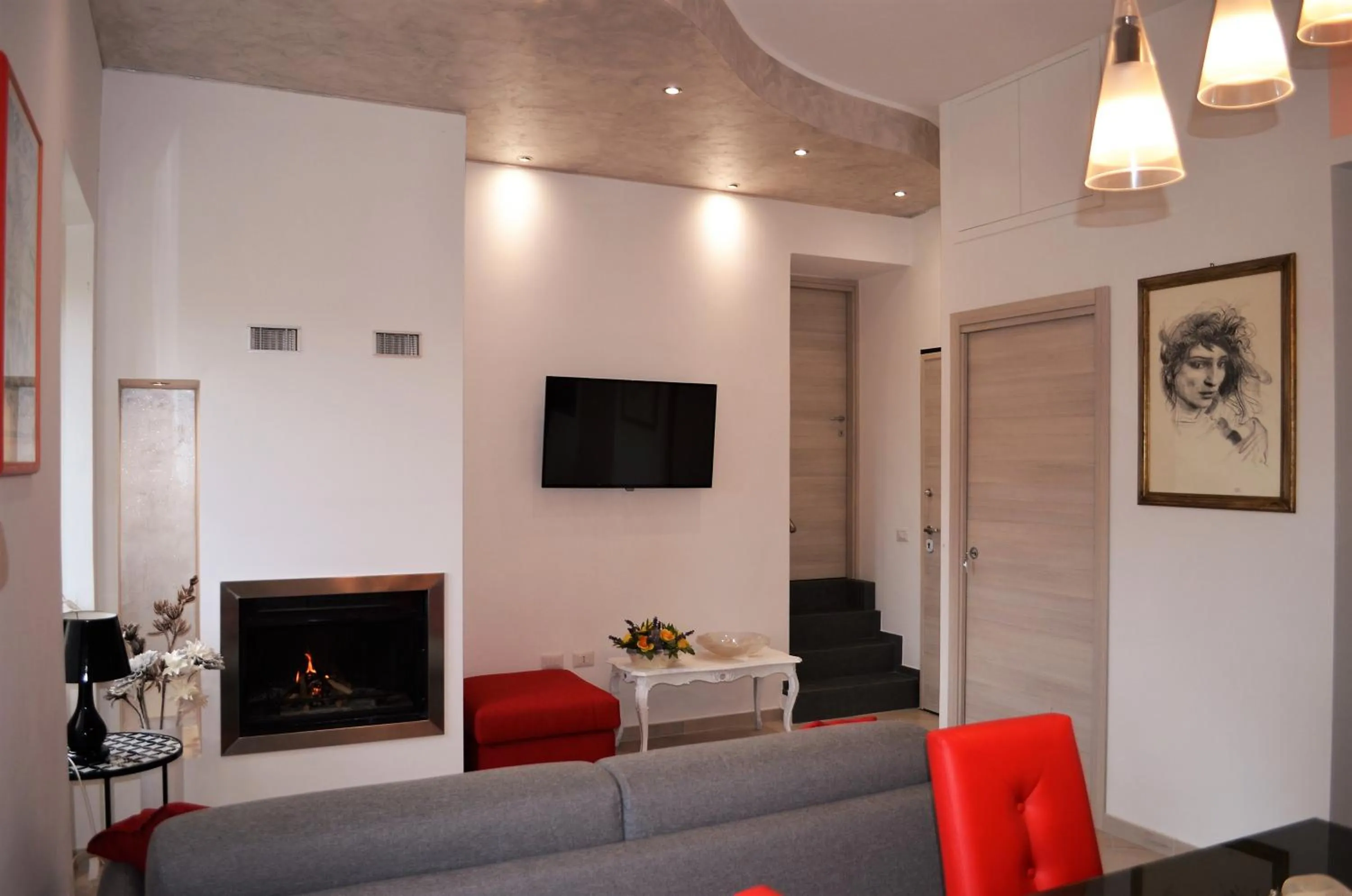 Communal lounge/ TV room in Il giardino di Elena