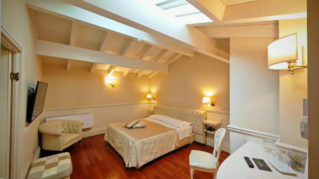 Bed in Suite Hotel Santa Chiara