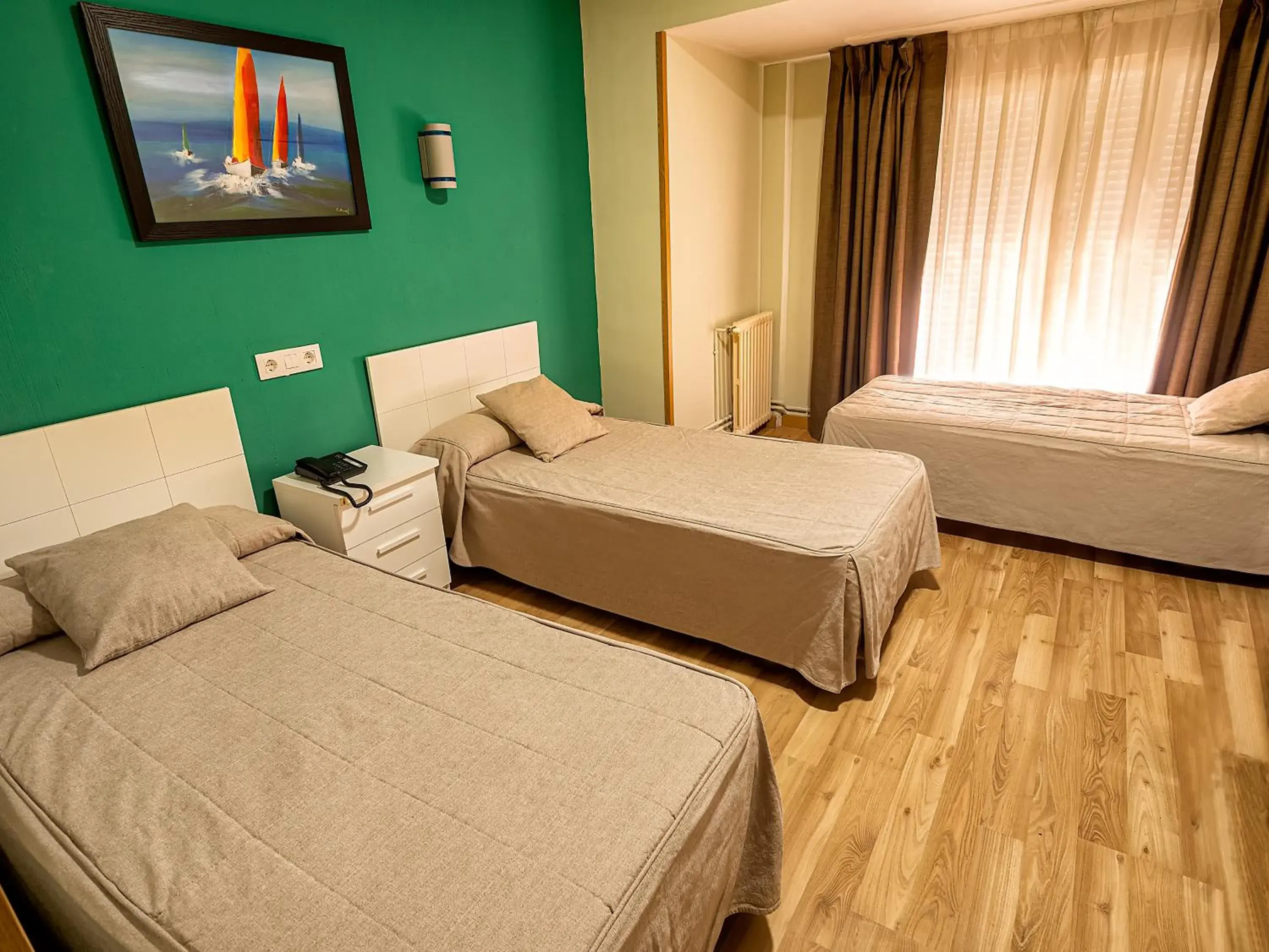 Triple Room in Hostal Real Aranjuez Triple Room in Hostal Real Aranjuez
