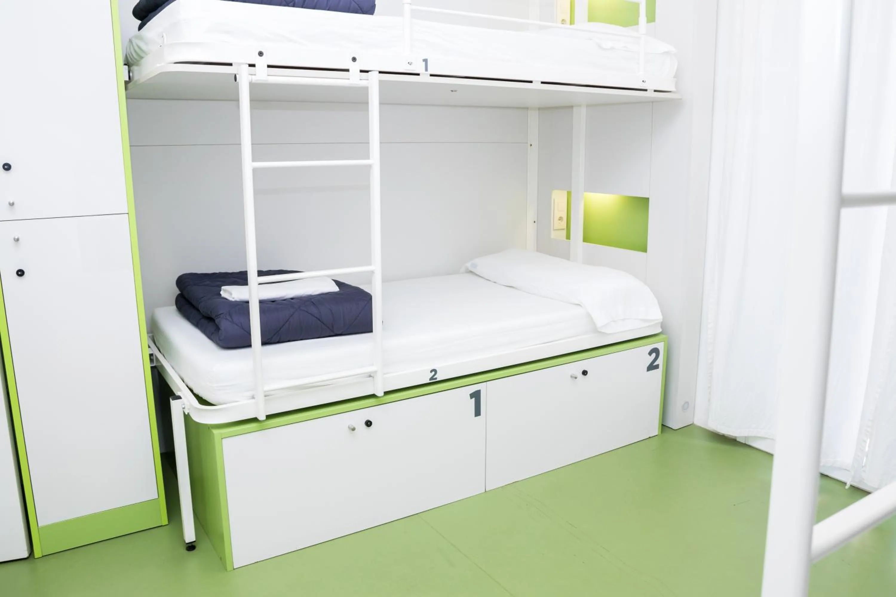 Decorative detail, Bed in Sant Jordi Hostels Gracia