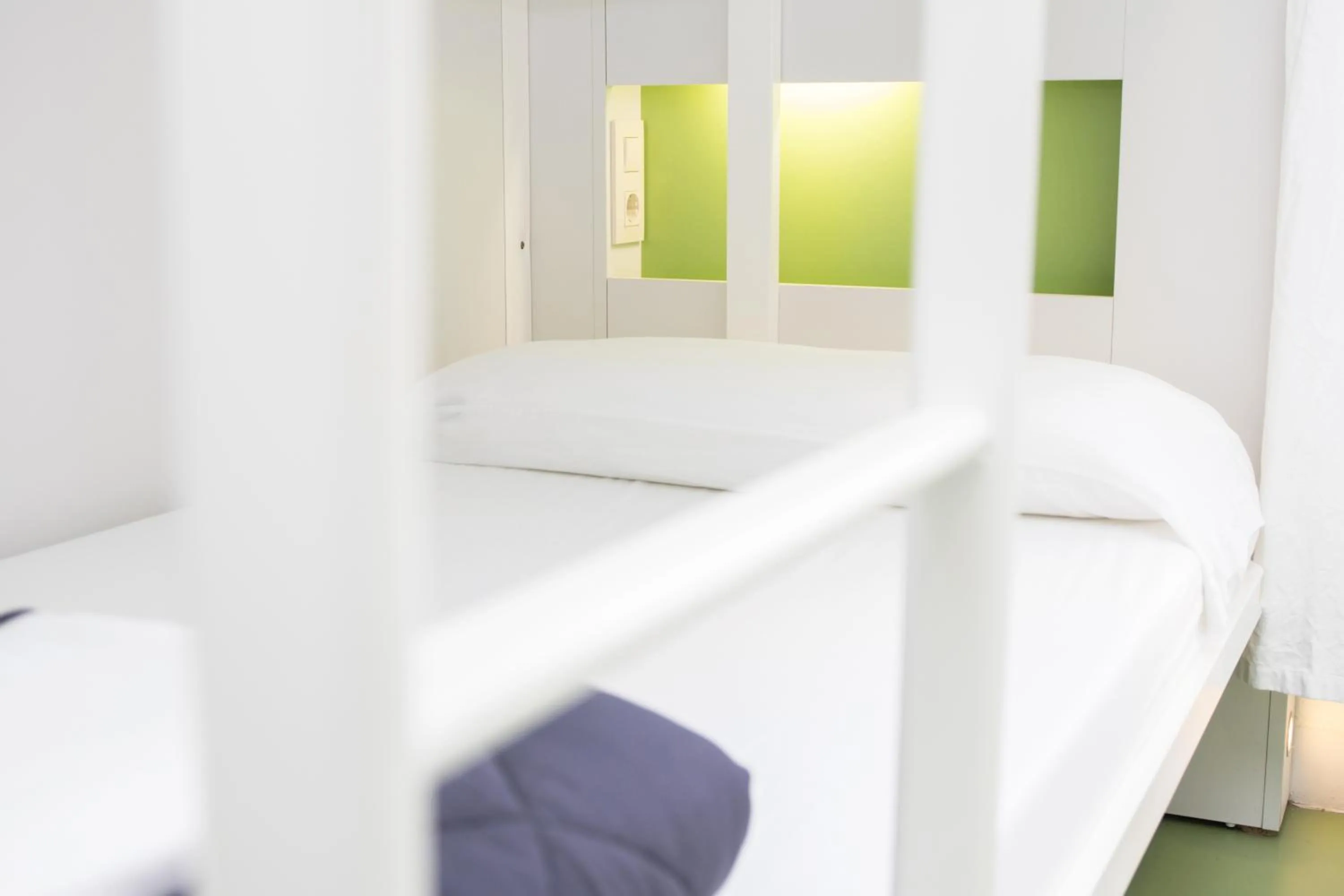 Decorative detail, Bed in Sant Jordi Hostels Gracia