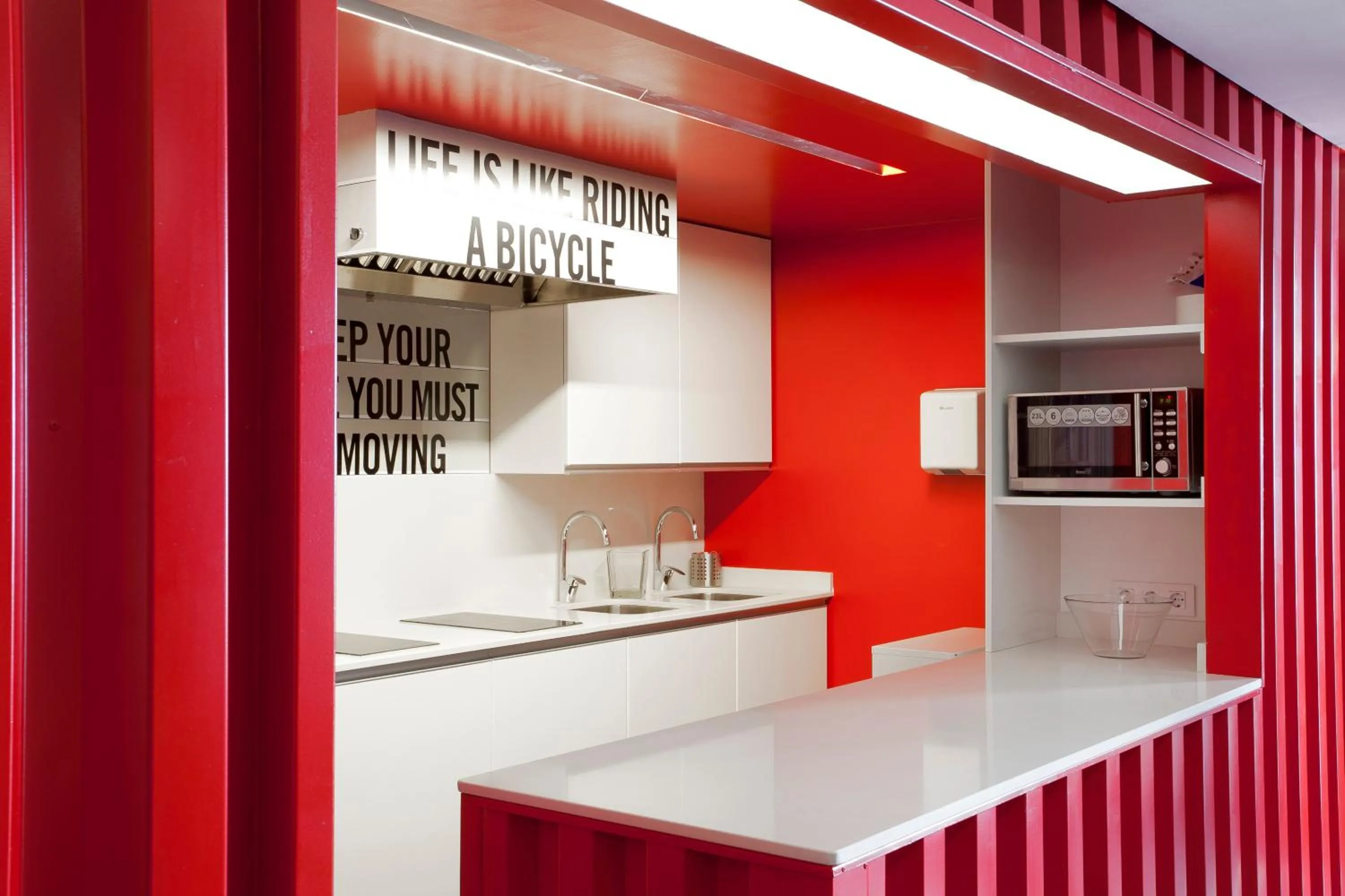 Communal kitchen in Sant Jordi Hostels Gracia