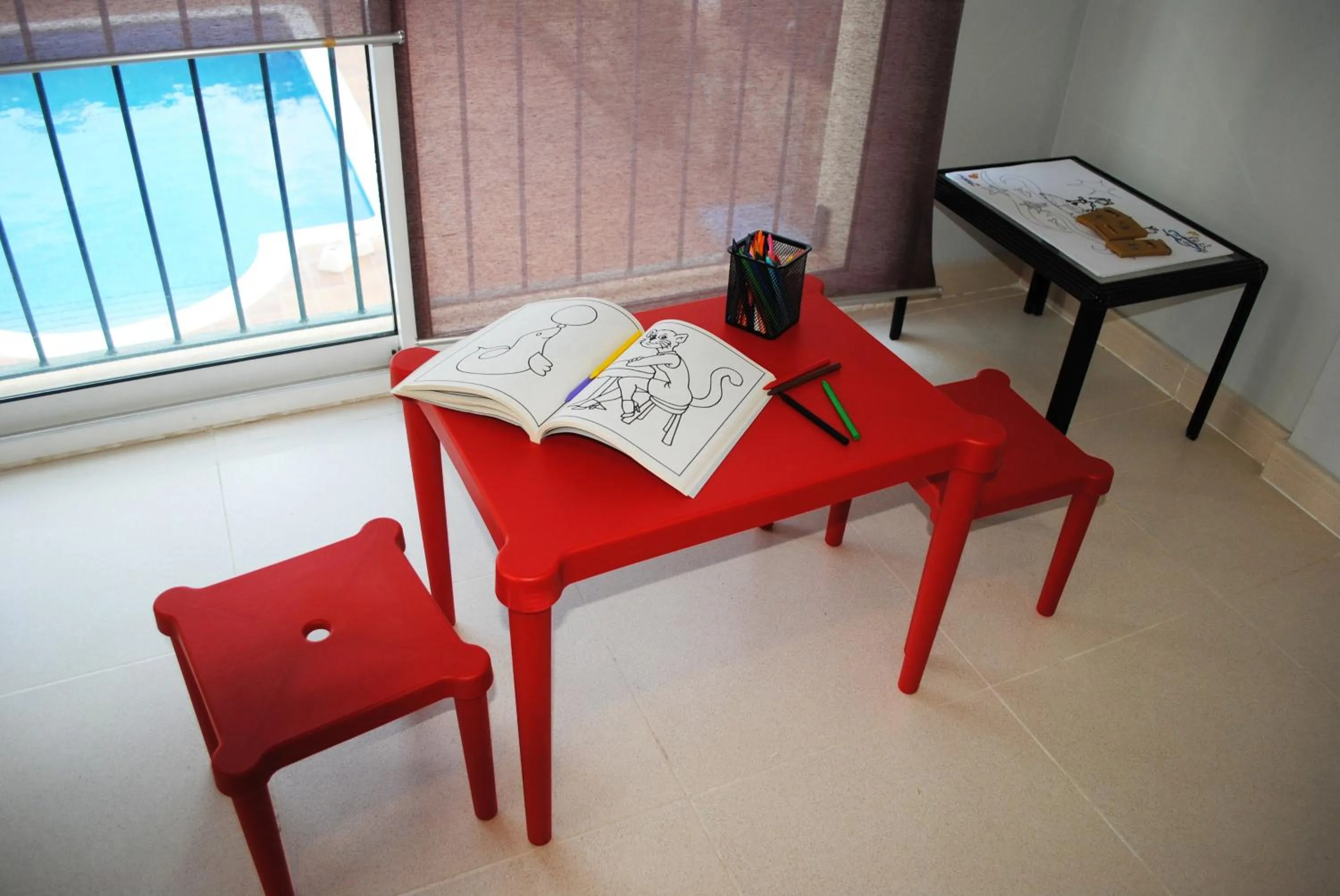 Communal lounge/ TV room in Hotel Sant Jordi