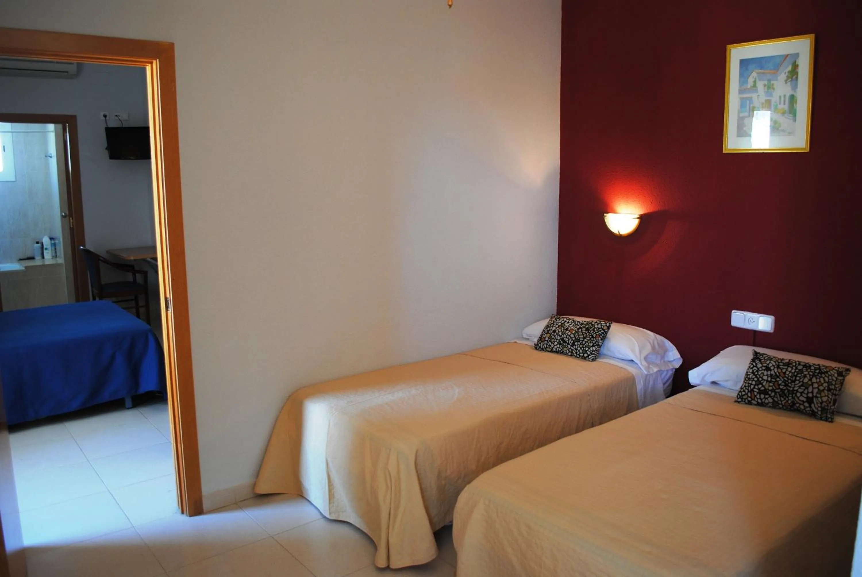 Bed in Hotel Sant Jordi