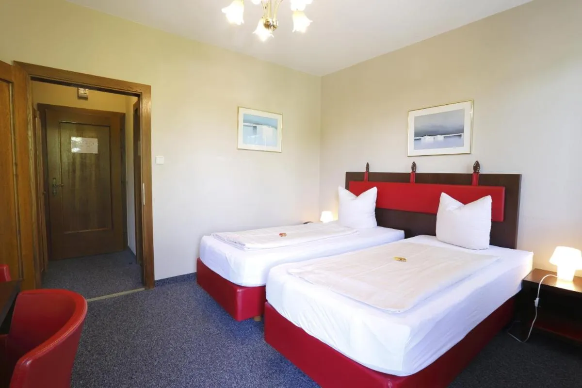 Bedroom, Bed in Alpen.Adria.Stadthotel