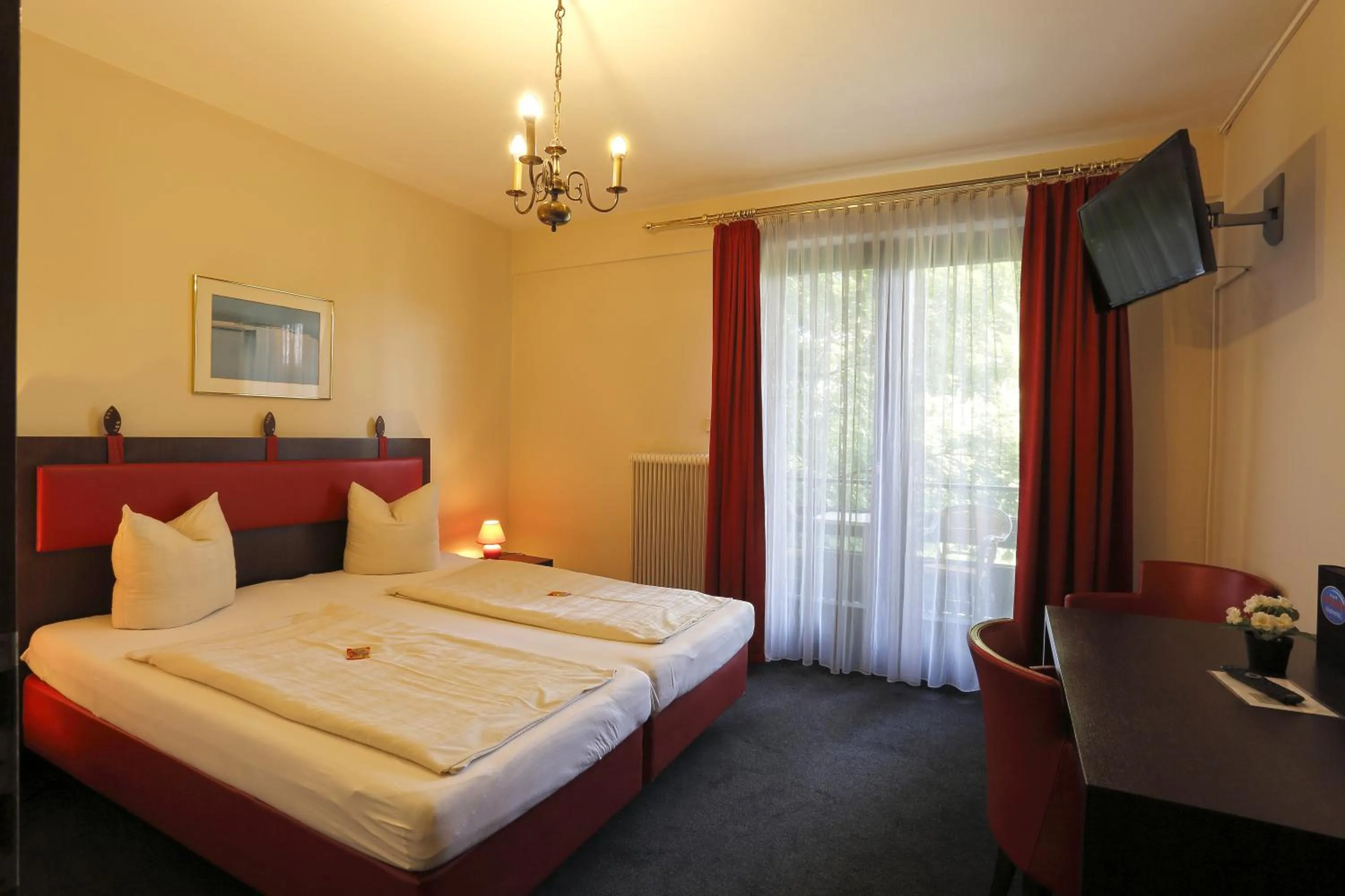 Photo of the whole room, Bed in Alpen.Adria.Stadthotel