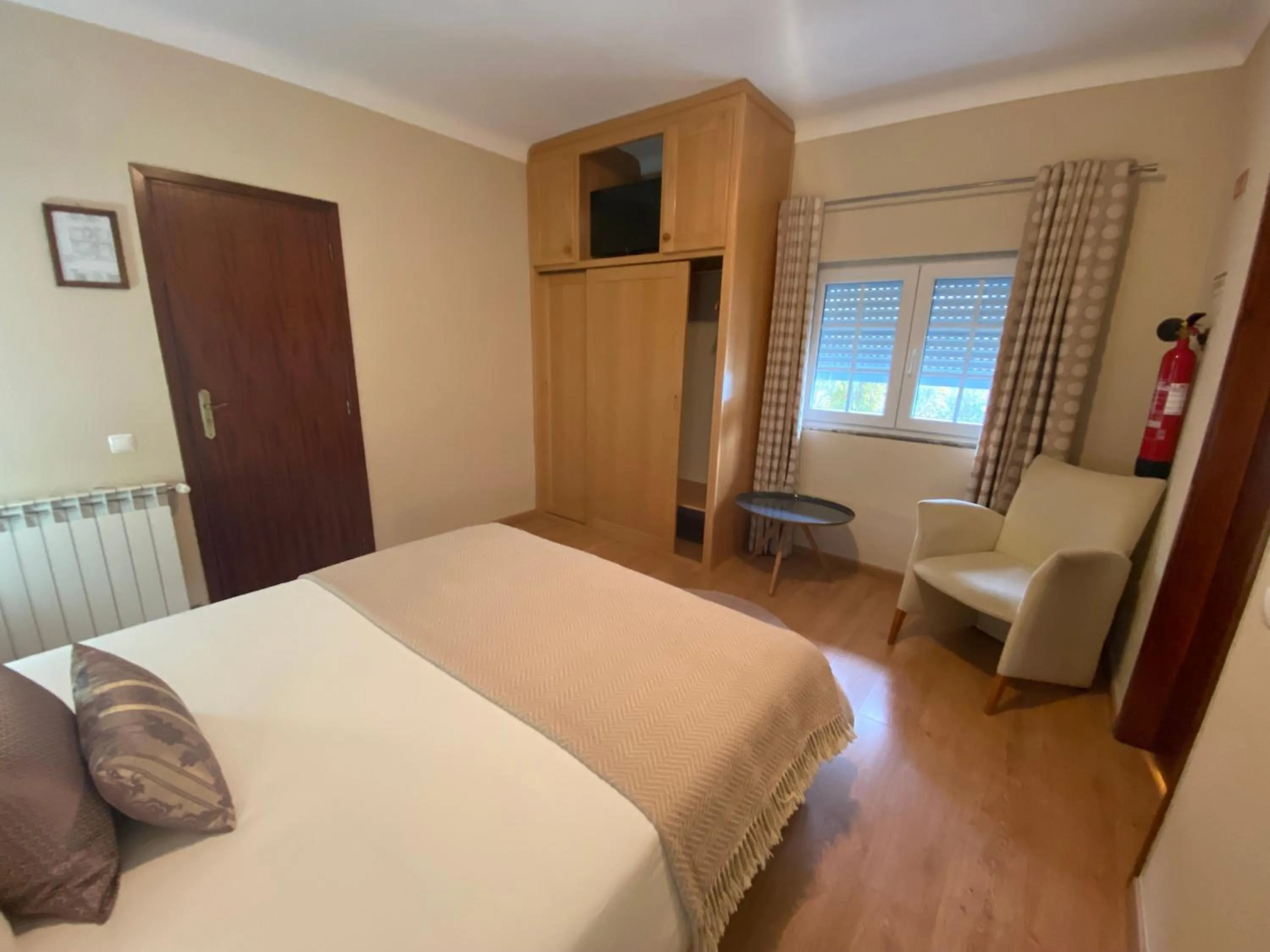 Photo of the whole room, Bed in Alfatima