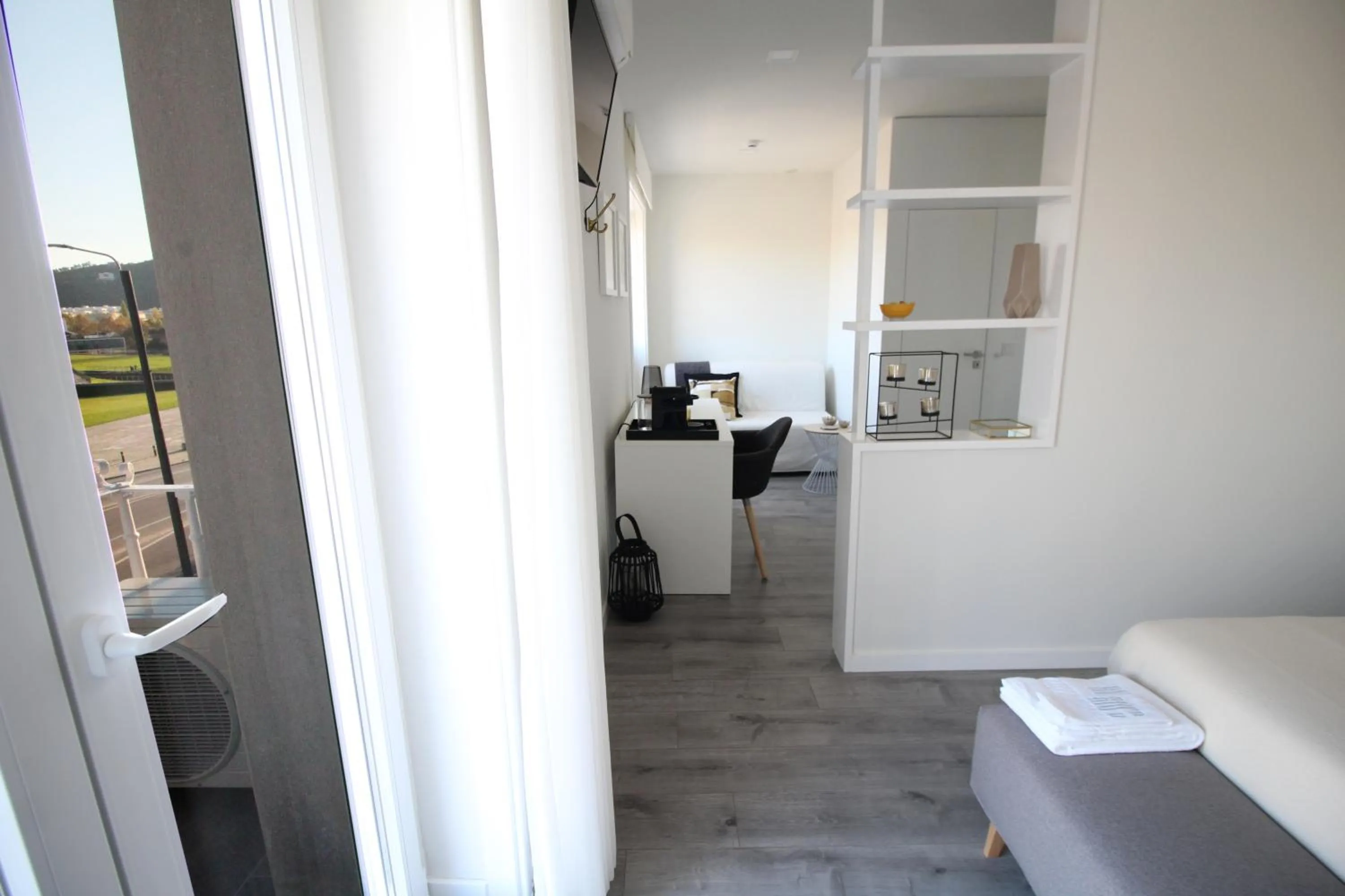 Living room in JR Studios & Suites I Rius I