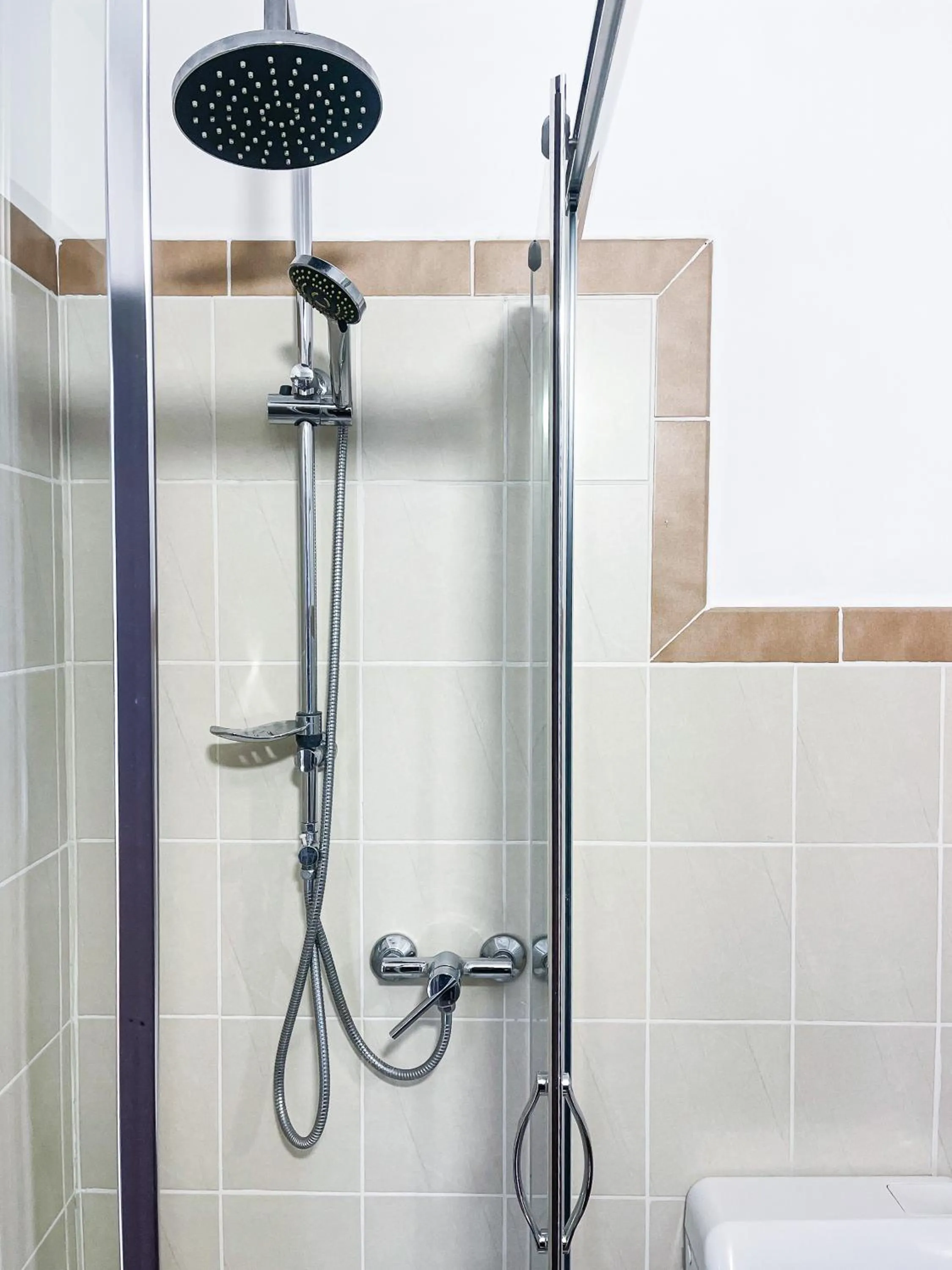 Shower in Atmosphere Hotel