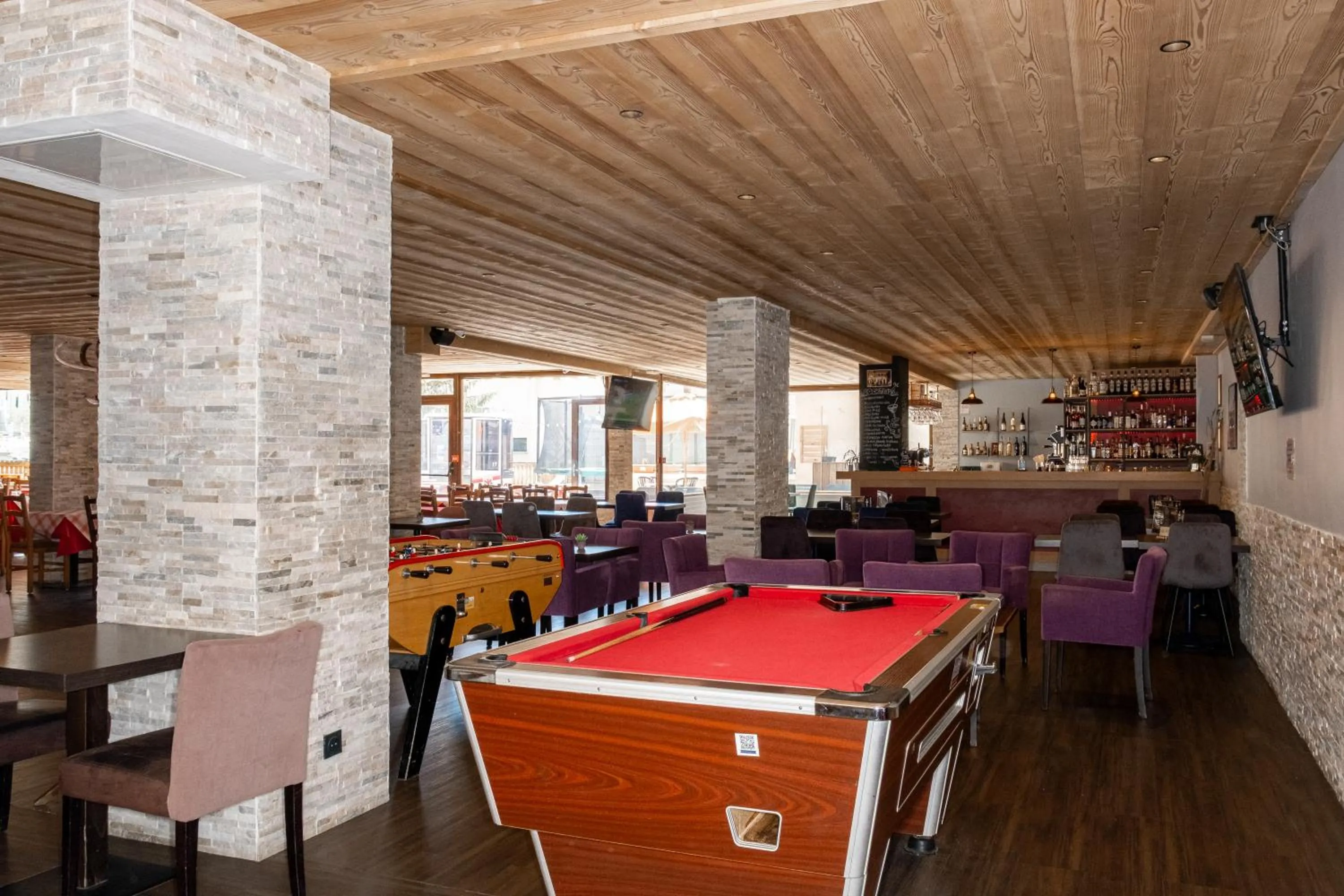 Communal lounge/ TV room in Atmosphere Hotel