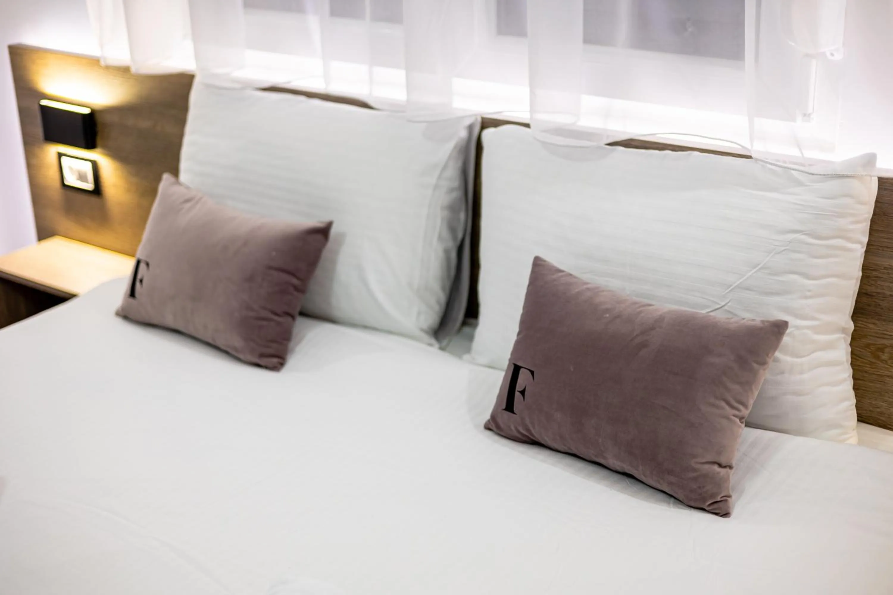 Bed in ForS Resort & Spa