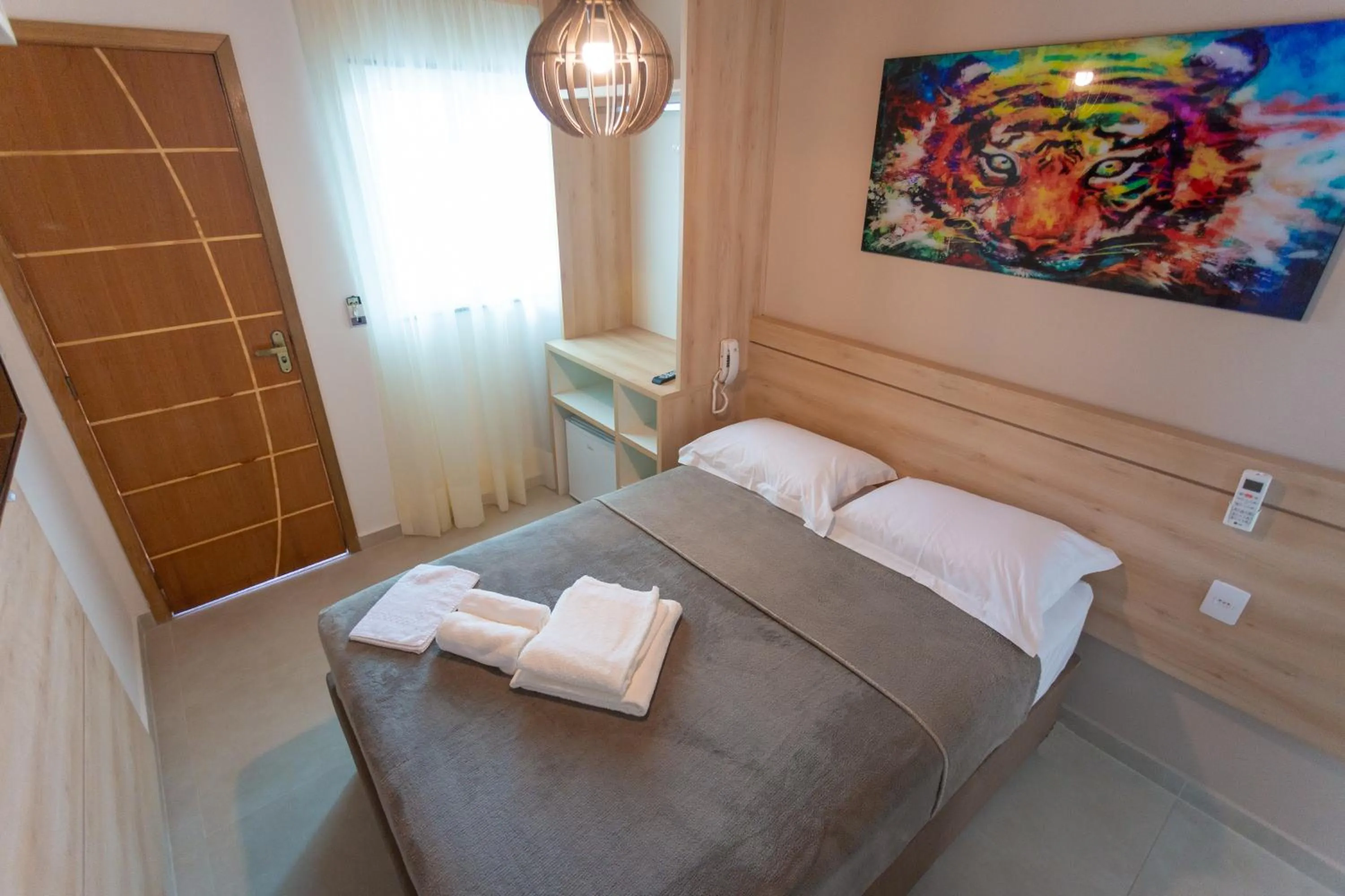 Bed in Pousada Nascer do Sol