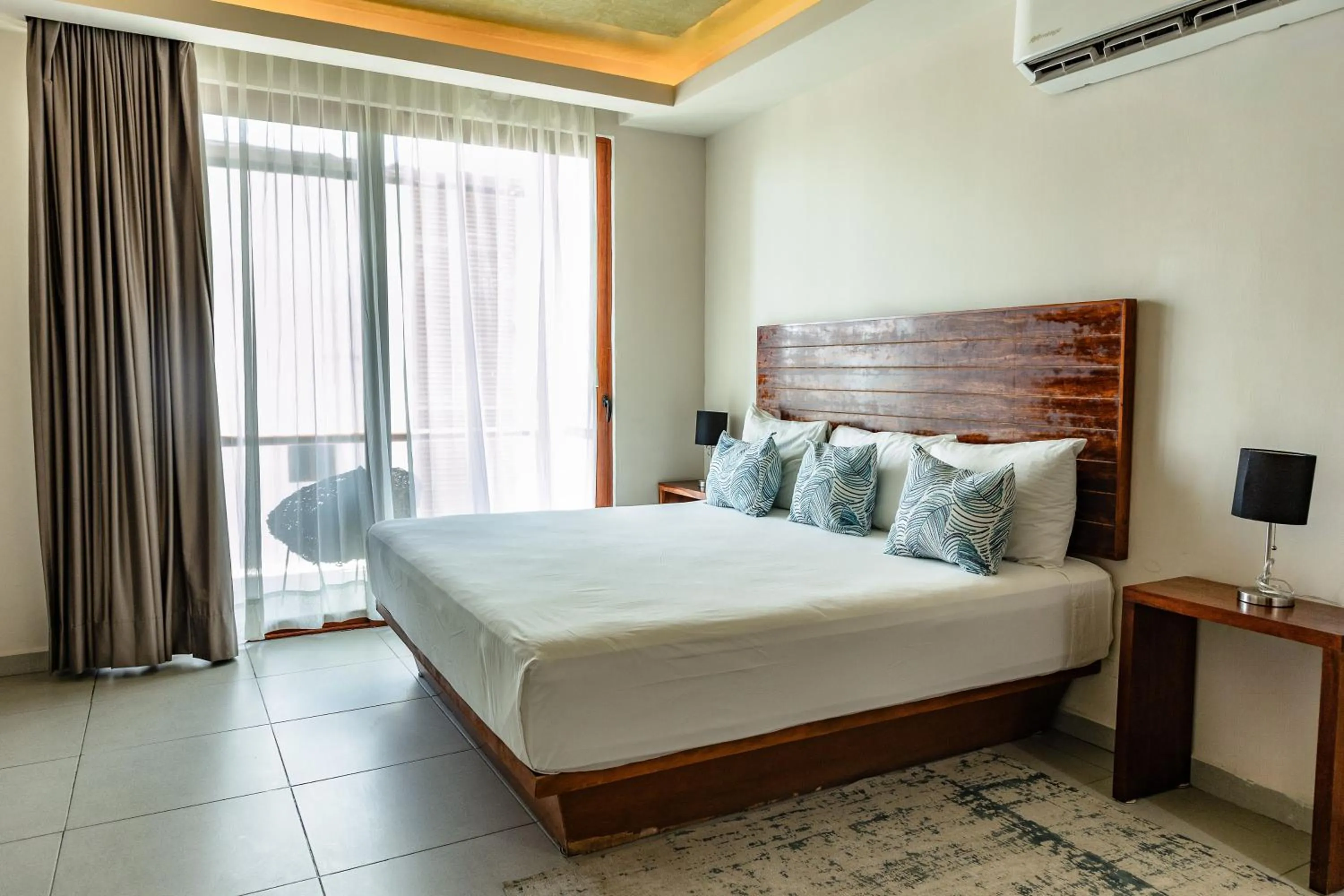 Bed in Aquastar Unique Hotel & Apartments Mahahual