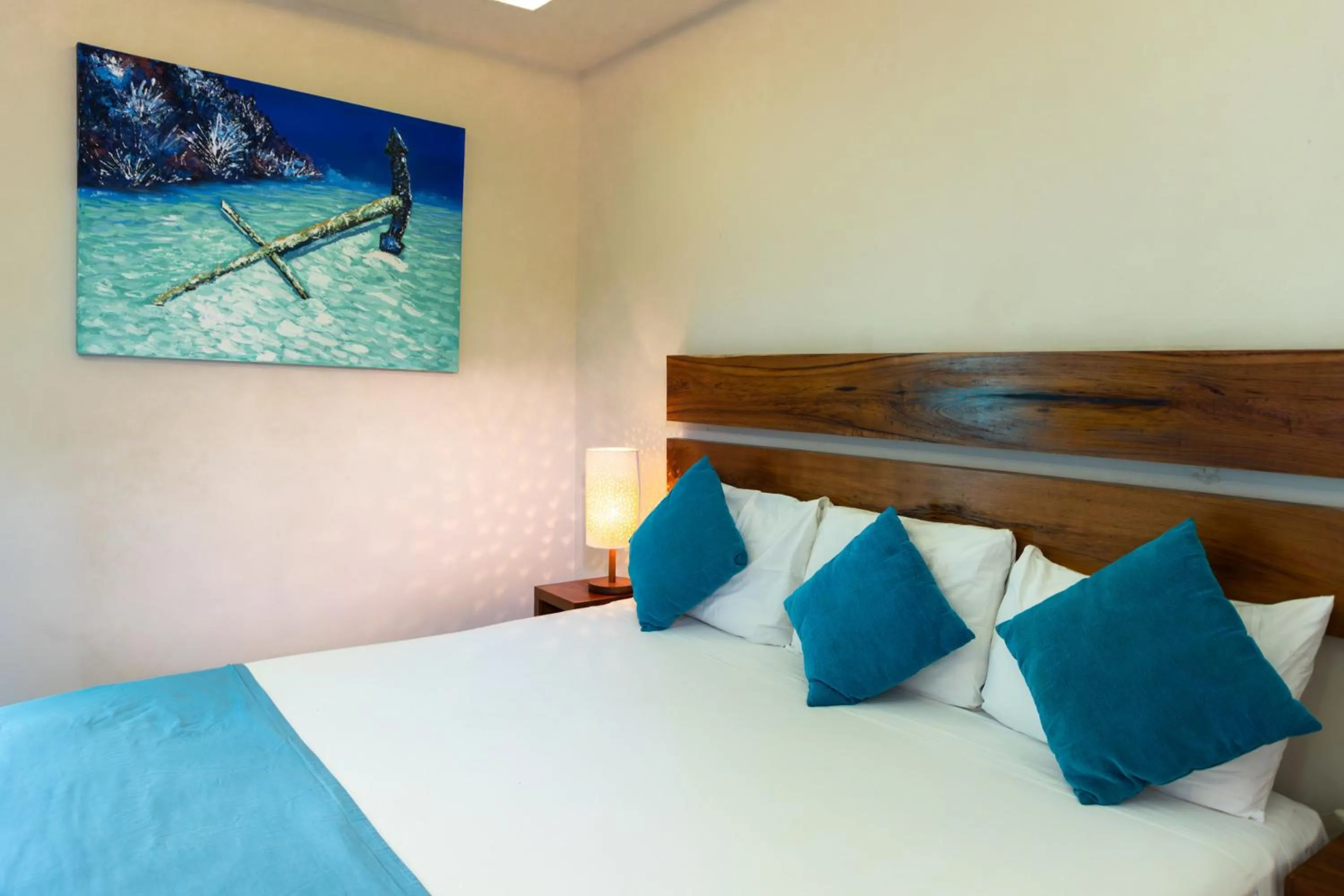 Bed in Aquastar Unique Hotel & Apartments Mahahual