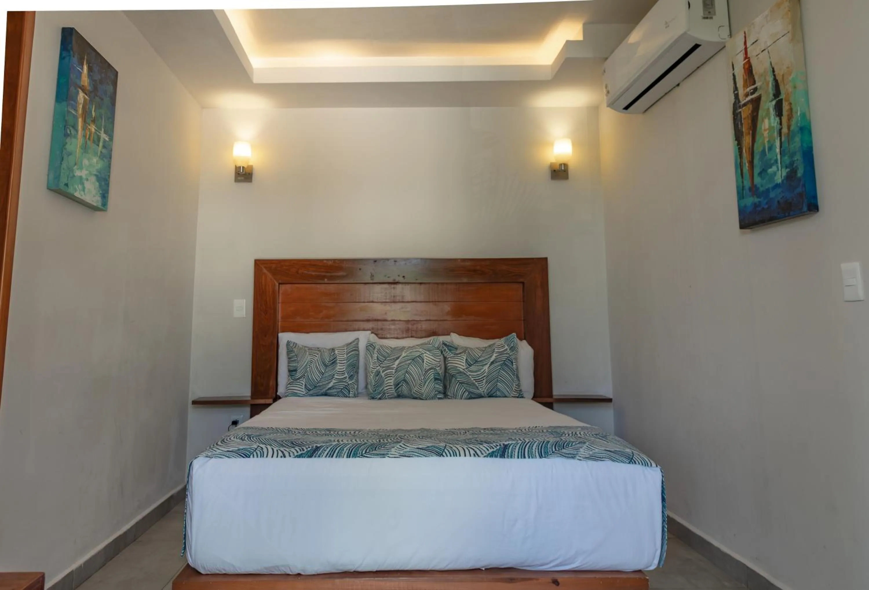 Bed in Aquastar Unique Hotel & Apartments Mahahual