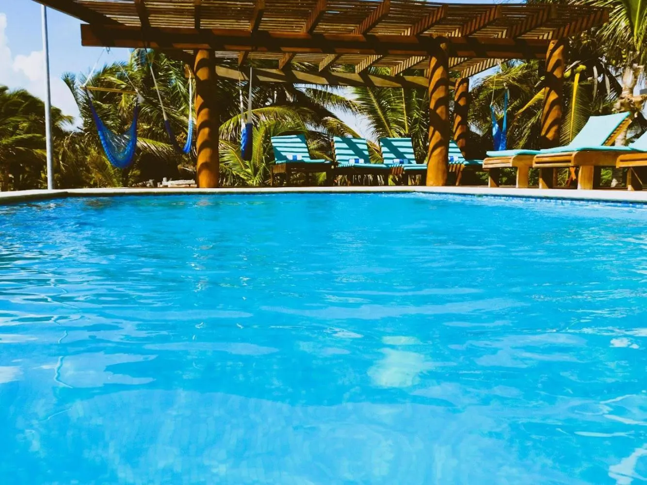 Swimming pool in Aquastar Unique Hotel & Apartments Mahahual