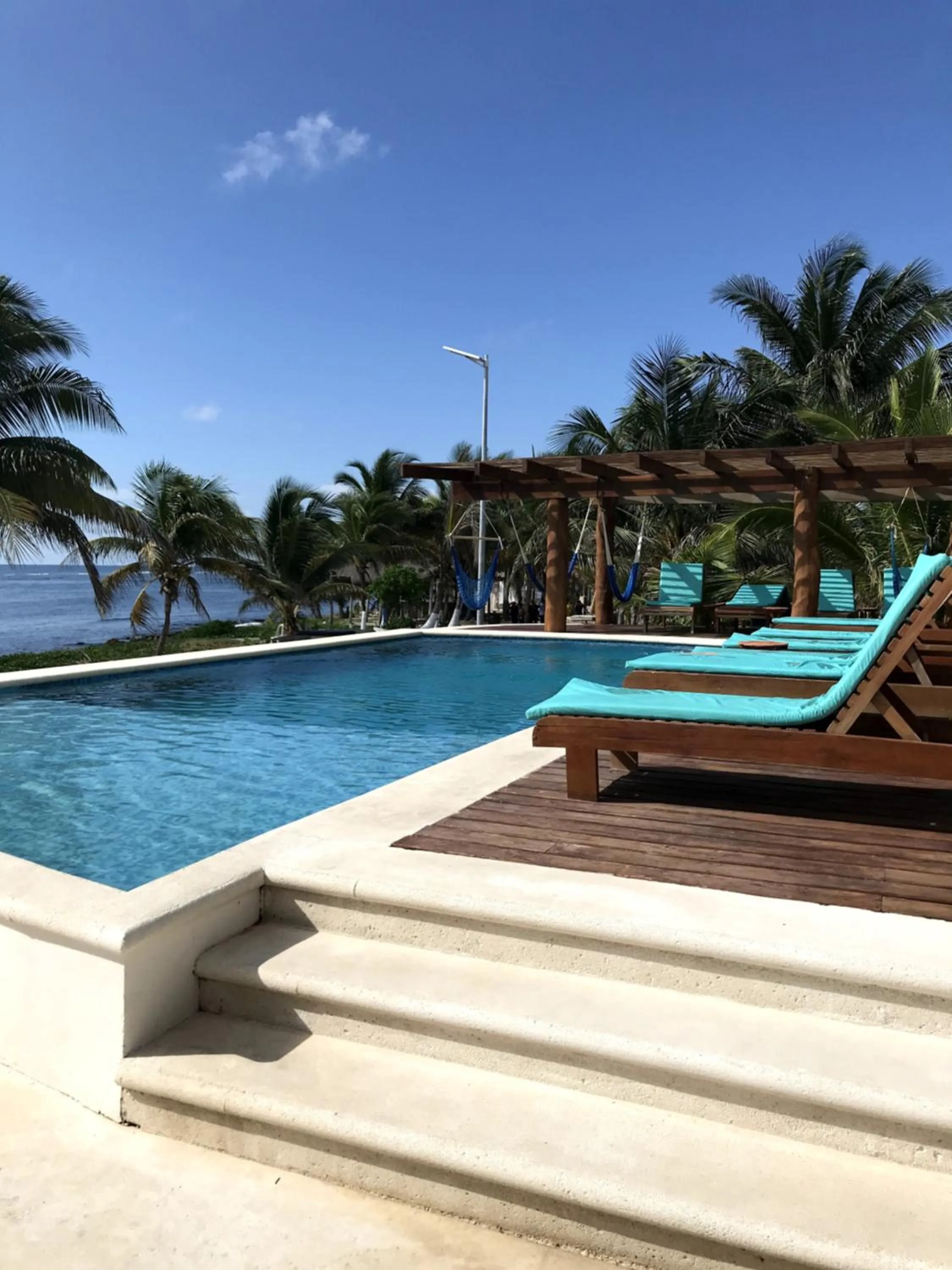 Swimming pool in Aquastar Unique Hotel & Apartments Mahahual