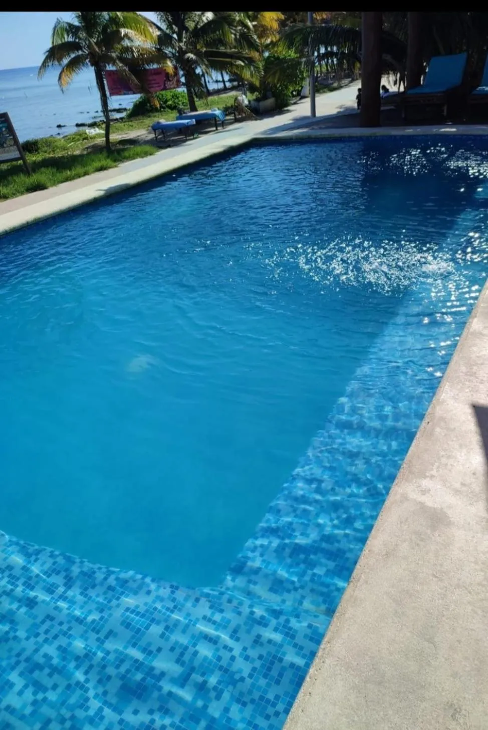 Swimming pool in Aquastar Unique Hotel & Apartments Mahahual