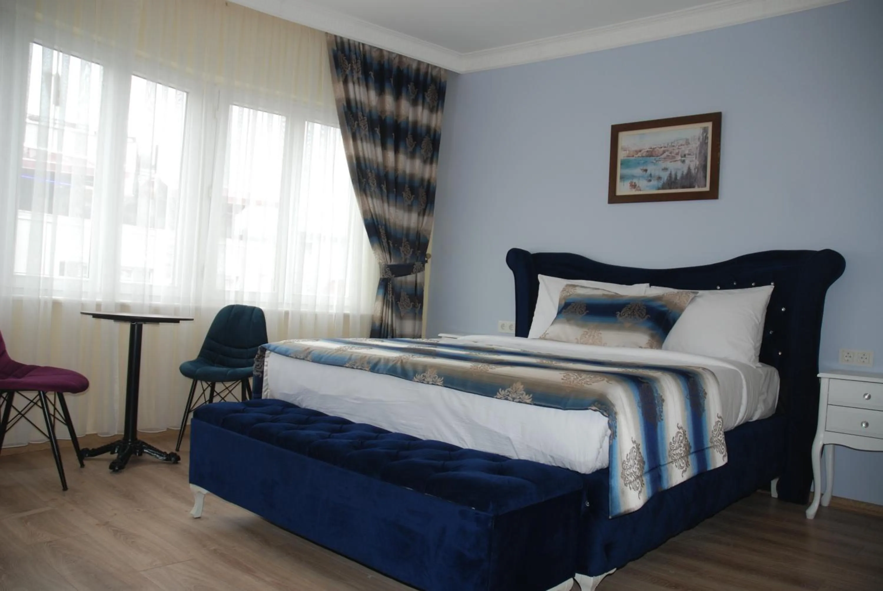 Bed in La Mer Boutique Hotel