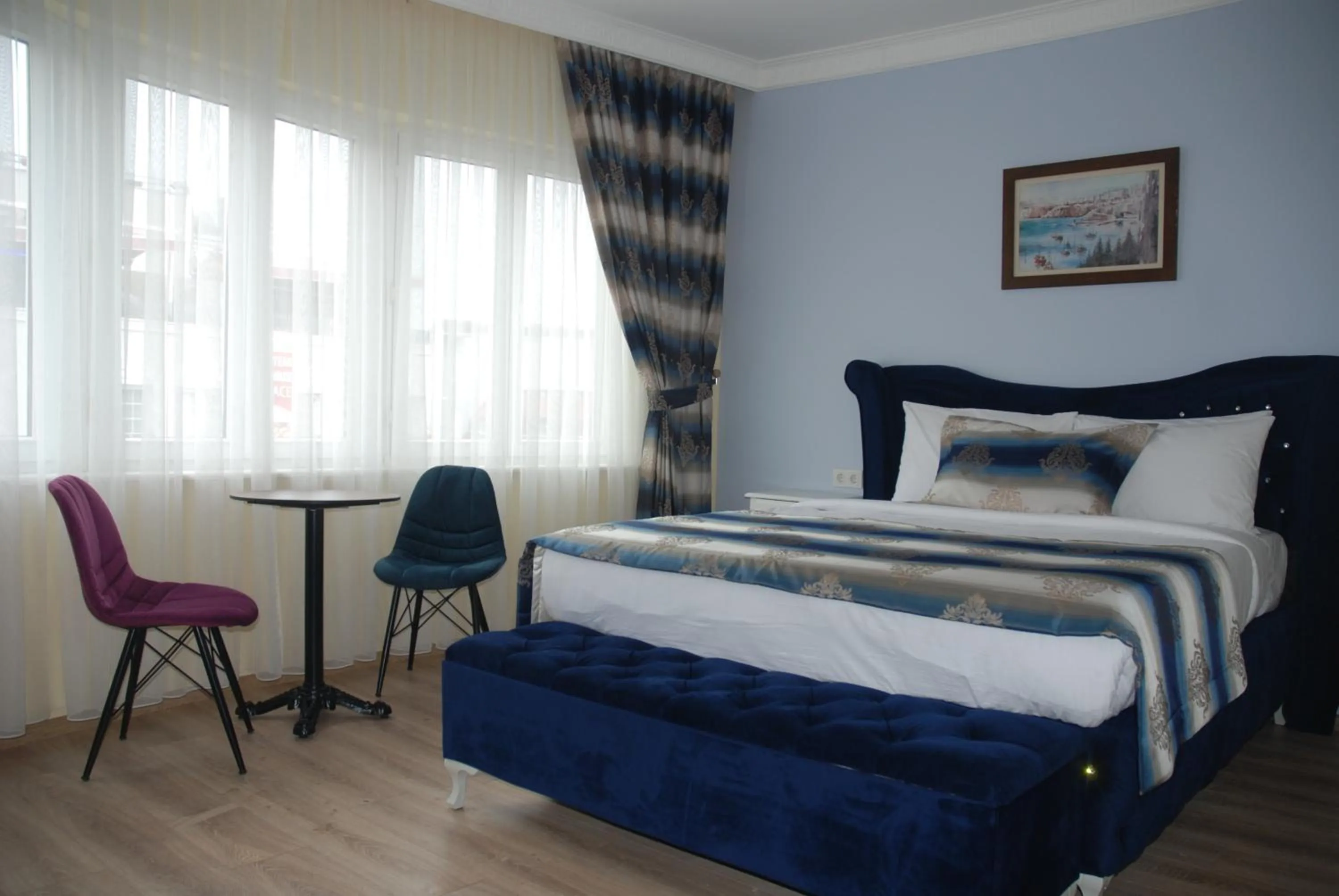 Bed in La Mer Boutique Hotel