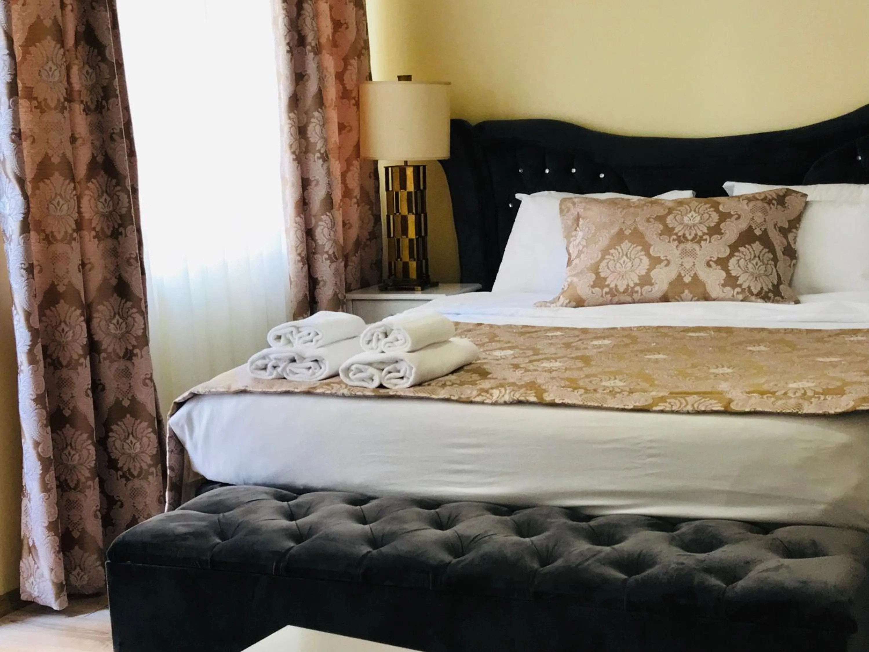 Bed in La Mer Boutique Hotel