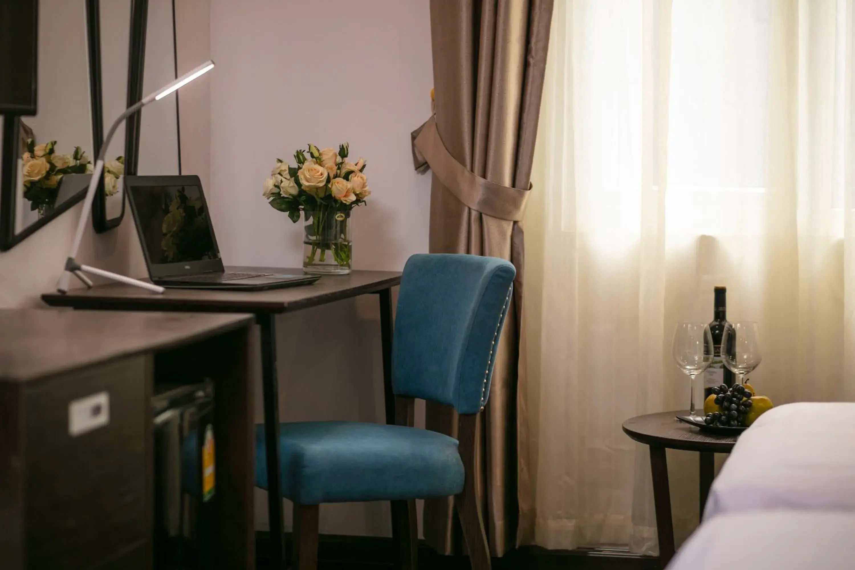 Seating area, Bed in Azalea Parkview Hotel Seating area, Bed in Azalea Parkview Hotel