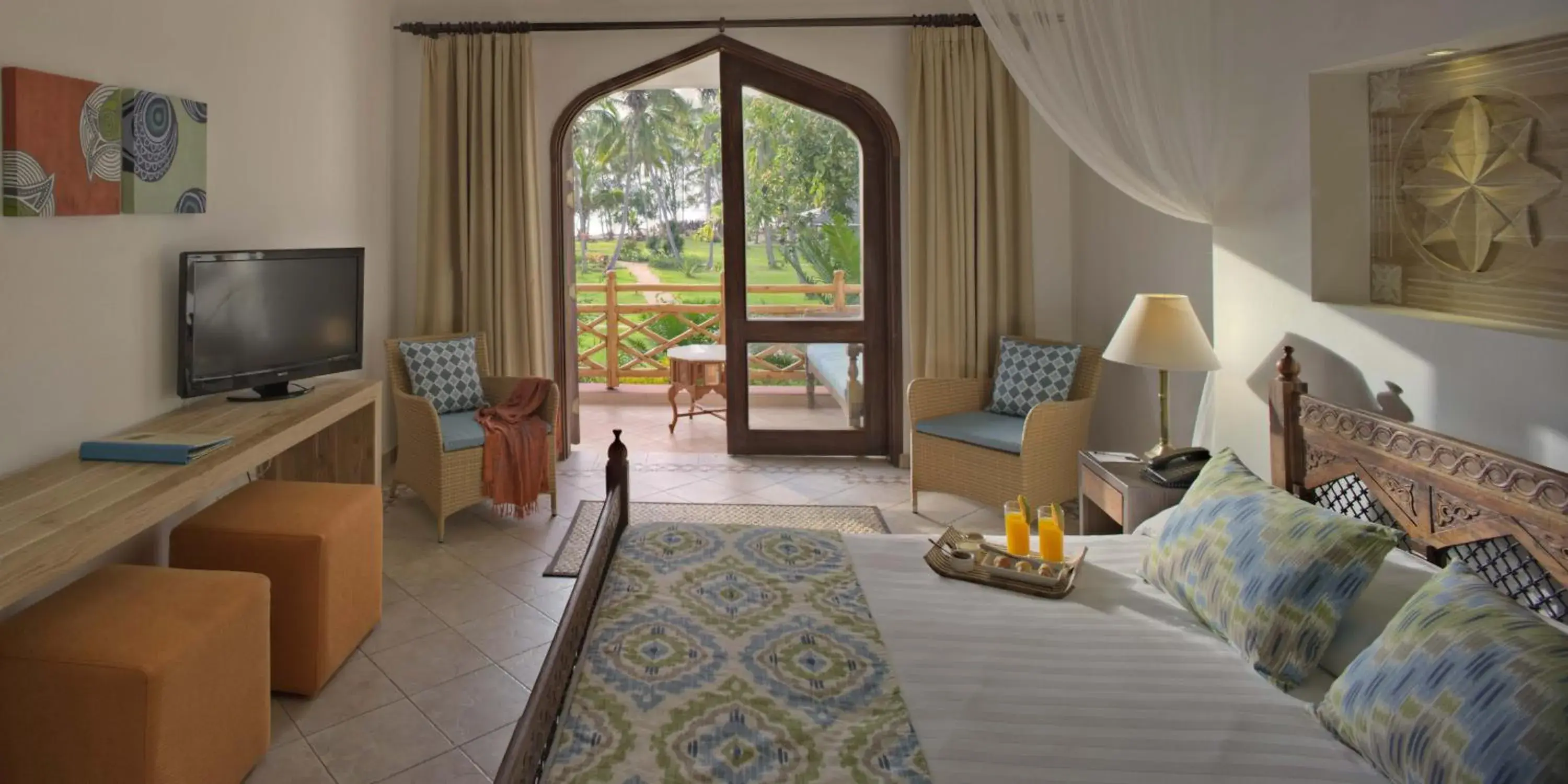 Photo of the whole room, Bed in Bluebay Beach Resort & Spa Photo of the whole room, Bed in Bluebay Beach Resort & Spa