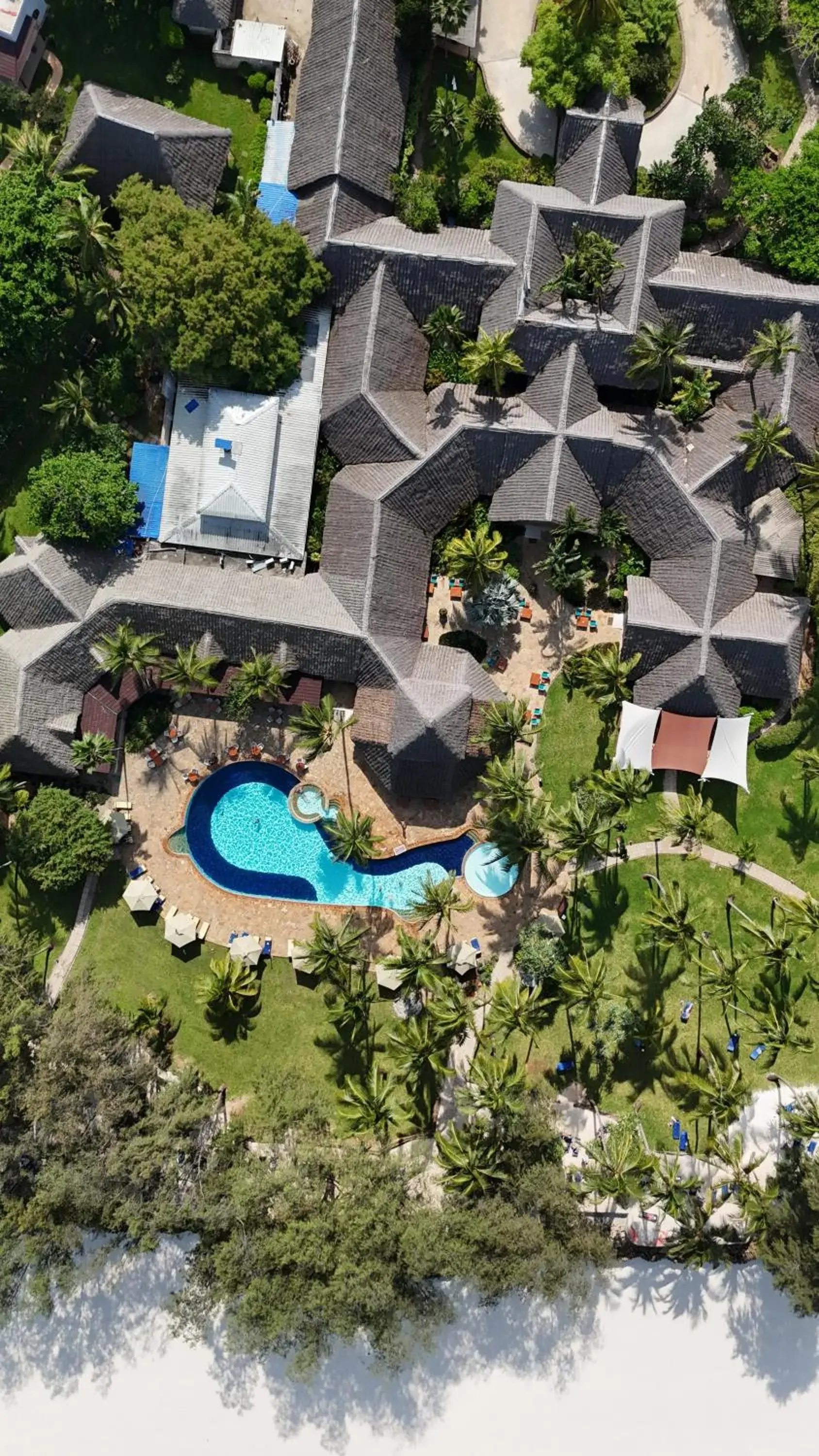 Swimming pool in Bluebay Beach Resort & Spa Swimming pool in Bluebay Beach Resort & Spa