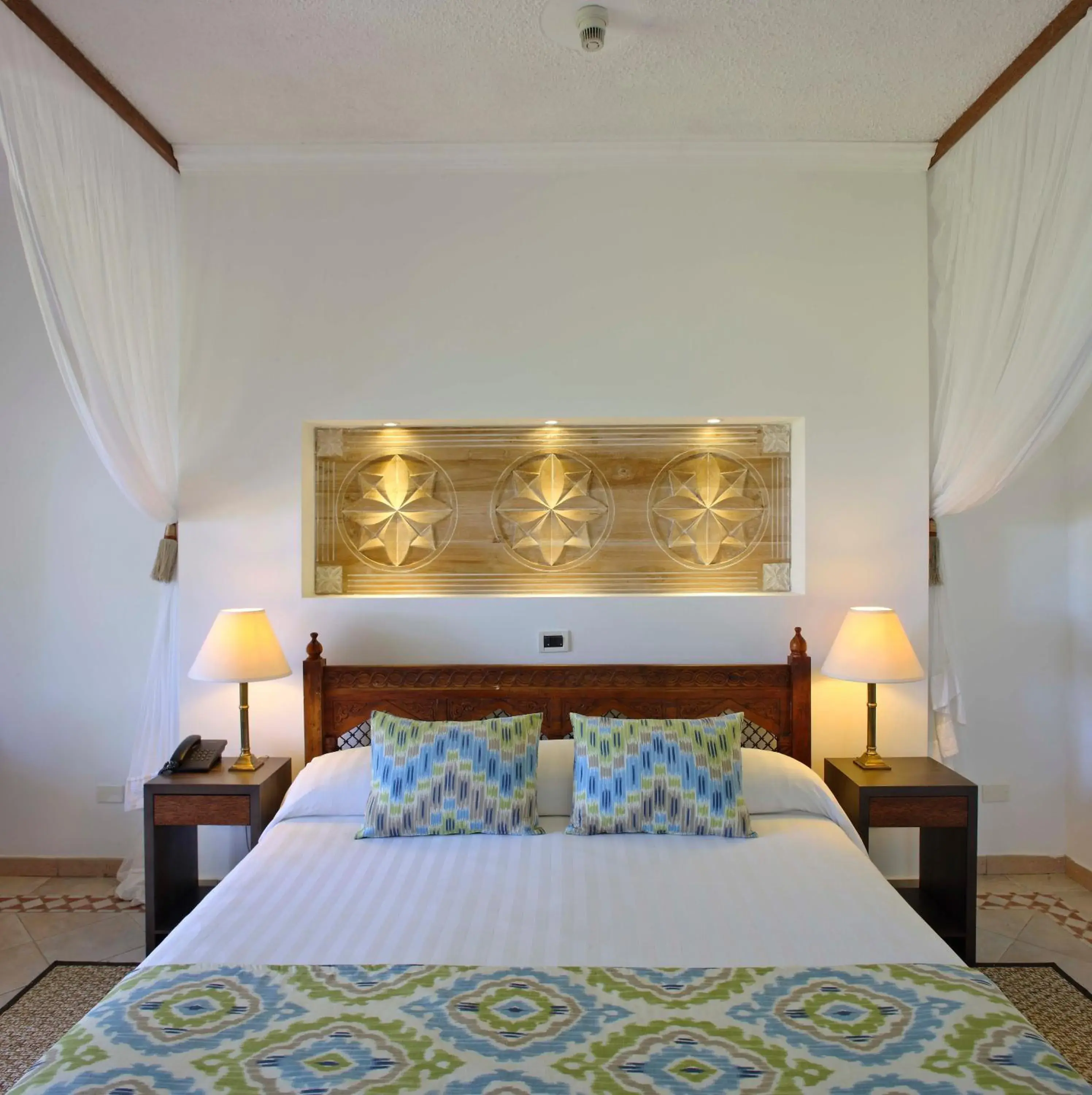 Photo of the whole room, Bed in Bluebay Beach Resort & Spa Photo of the whole room, Bed in Bluebay Beach Resort & Spa