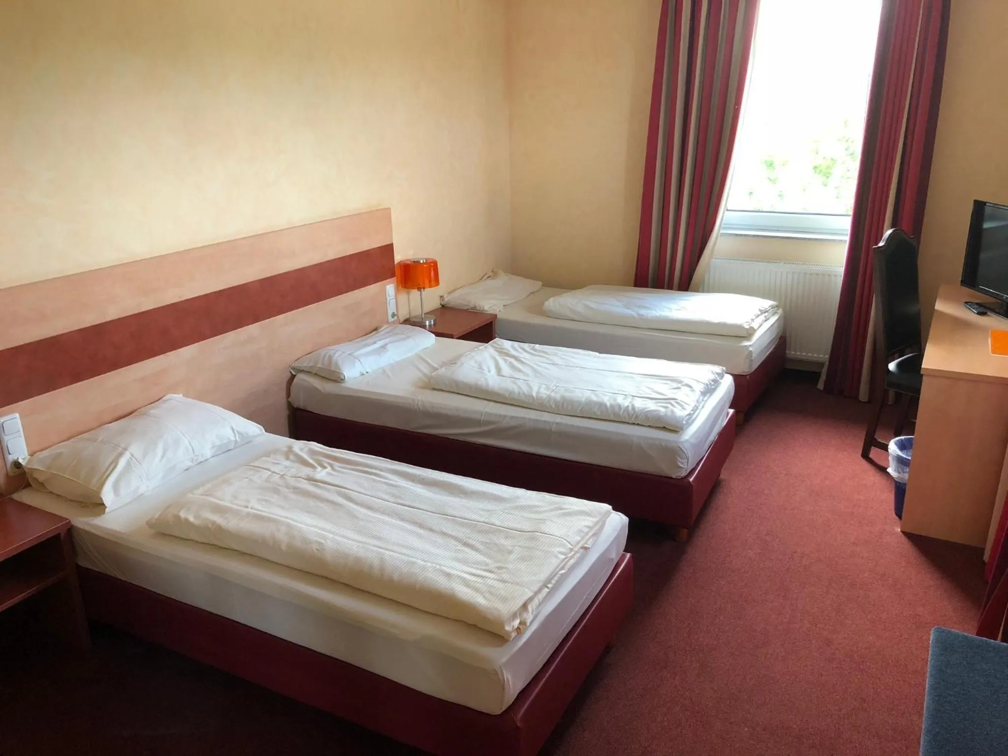 Photo of the whole room, Bed in Schleswig Holstein Hotel
