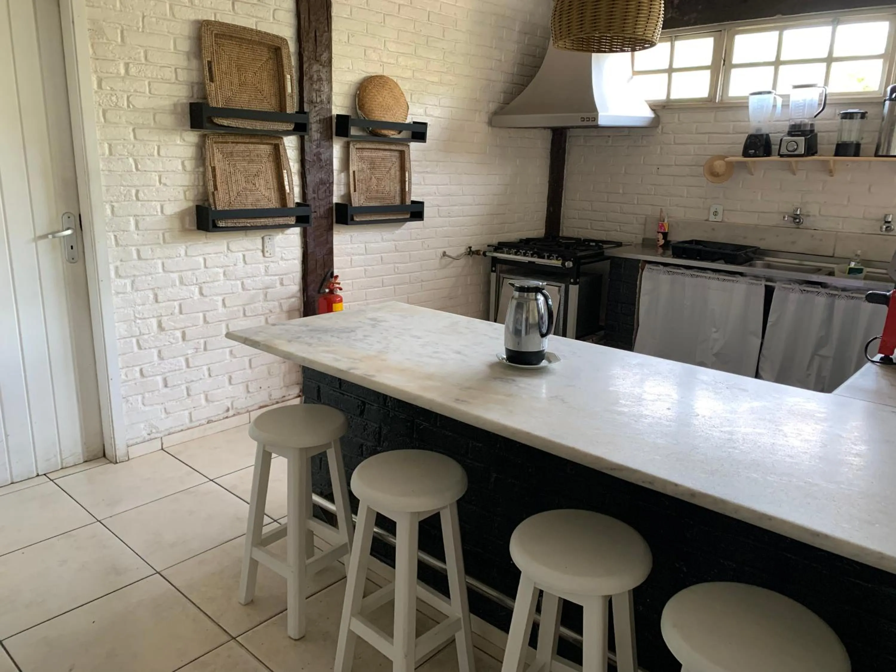 kitchen in Pousada Mainá