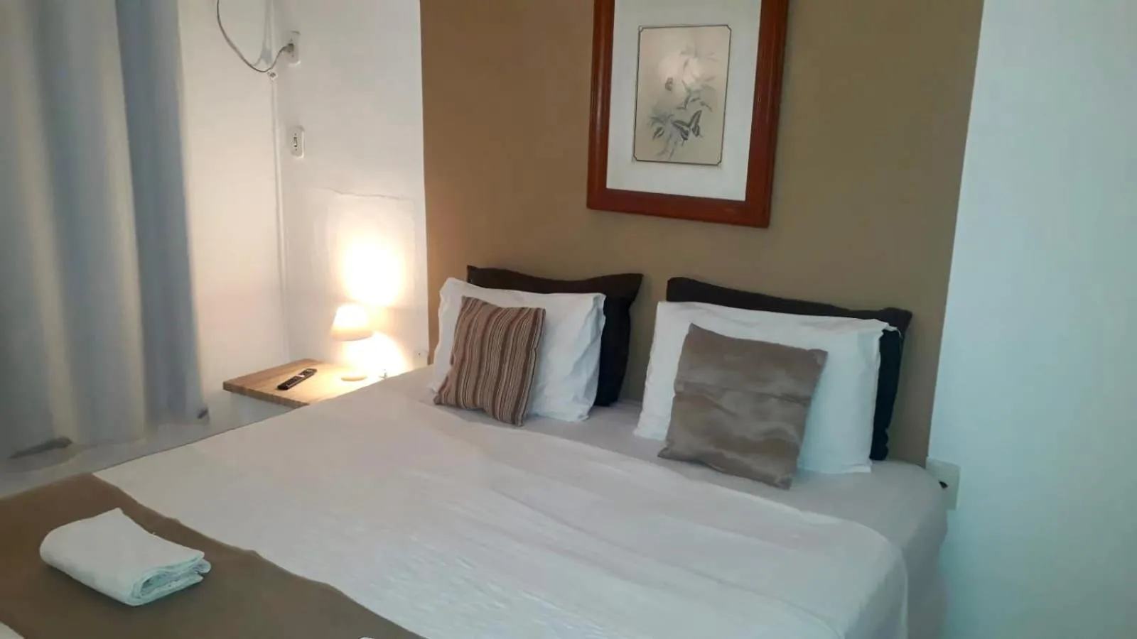 Bed in Pousada Mainá