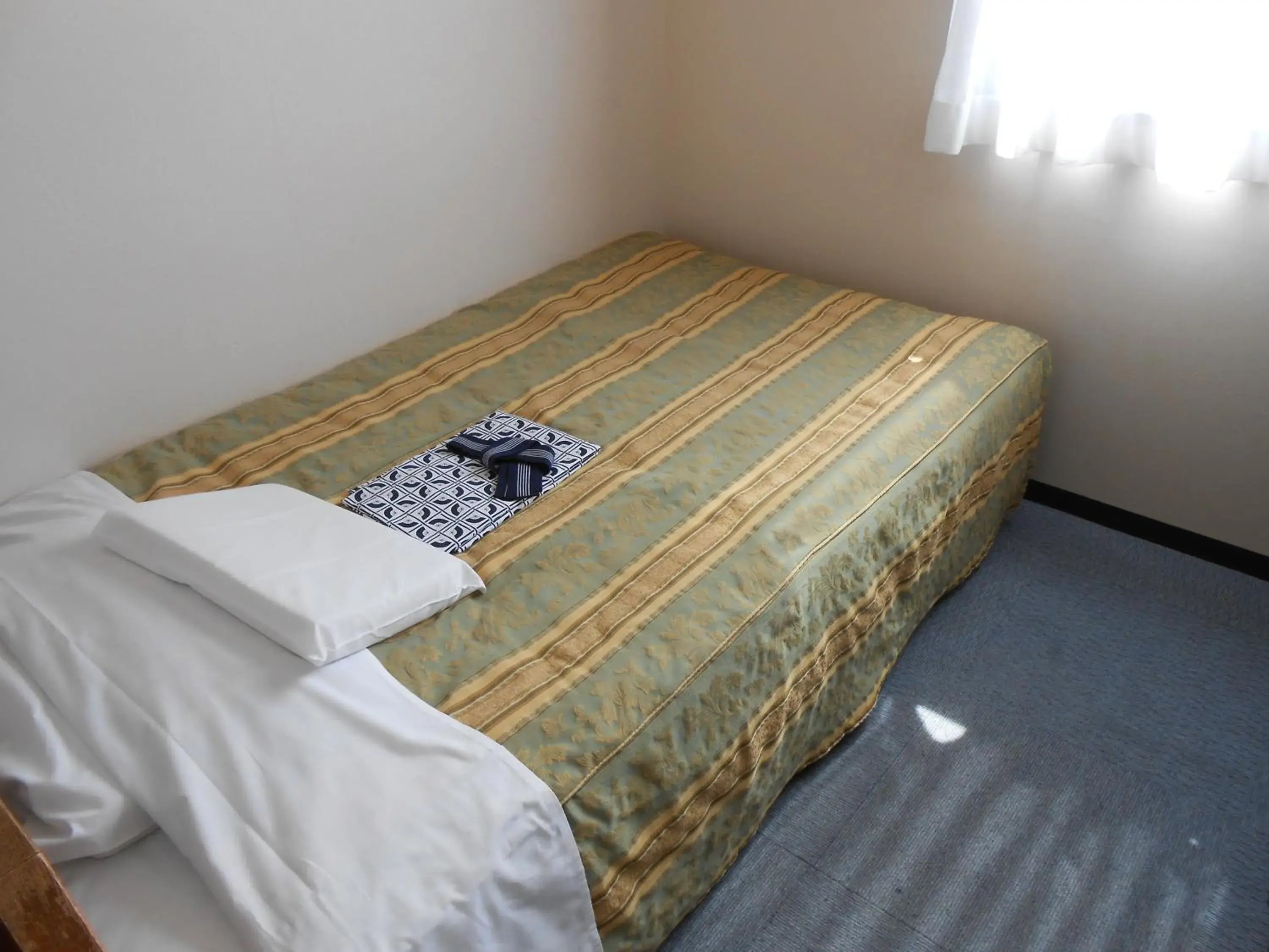 Bed in Terminal Art Inn Bed in Terminal Art Inn