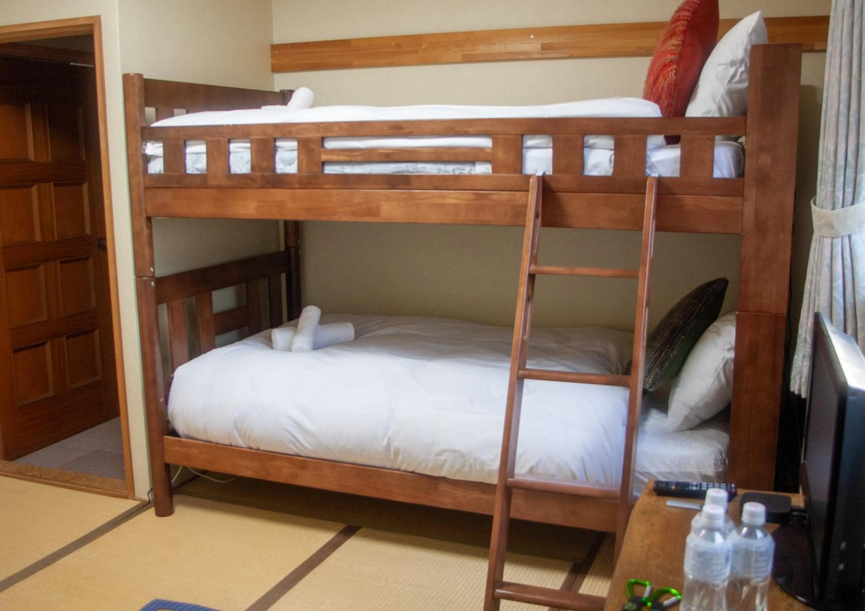 Bed in Kizuna Lodge & BBQ Centre