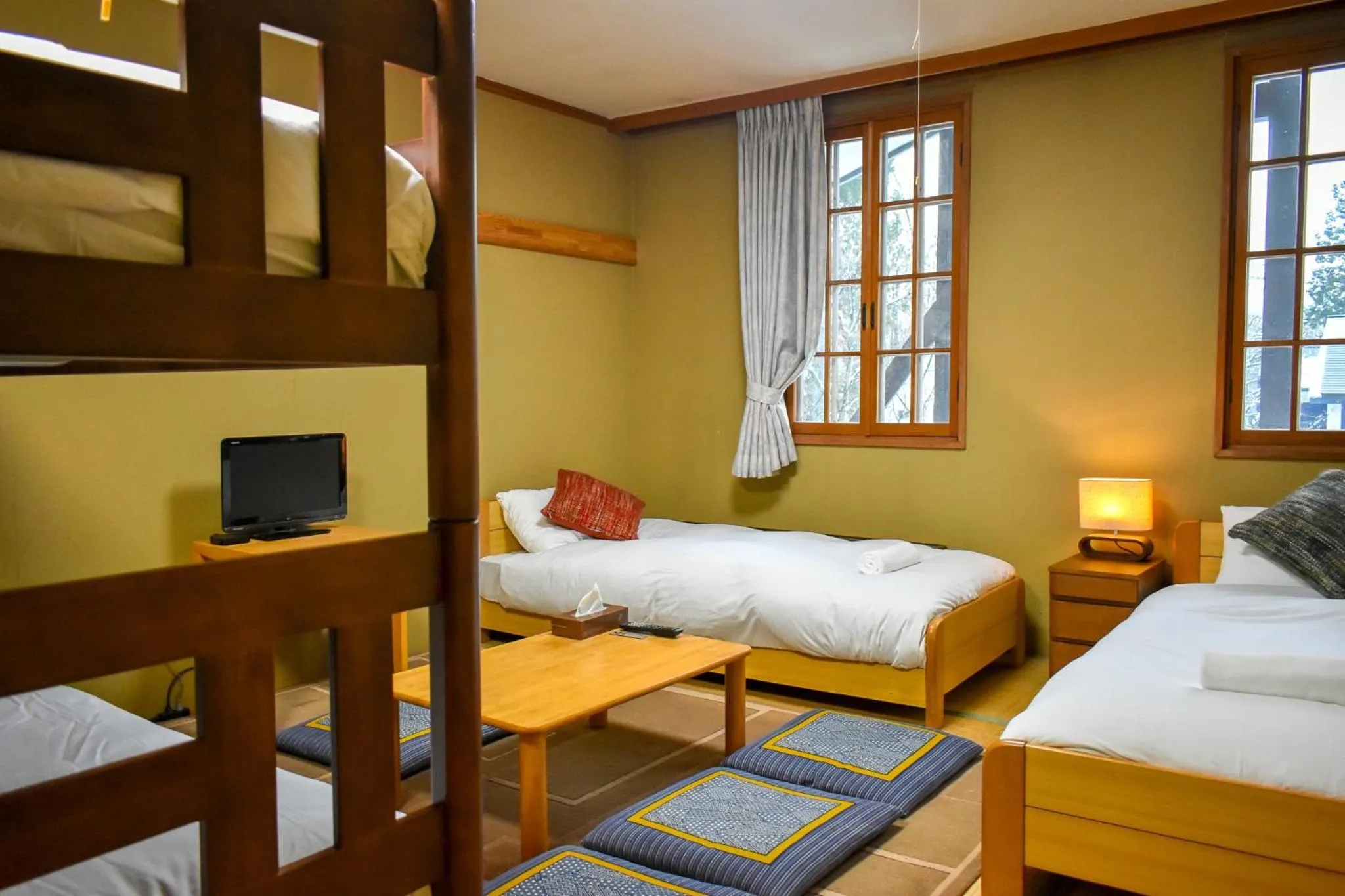 Bed in Kizuna Lodge & BBQ Centre