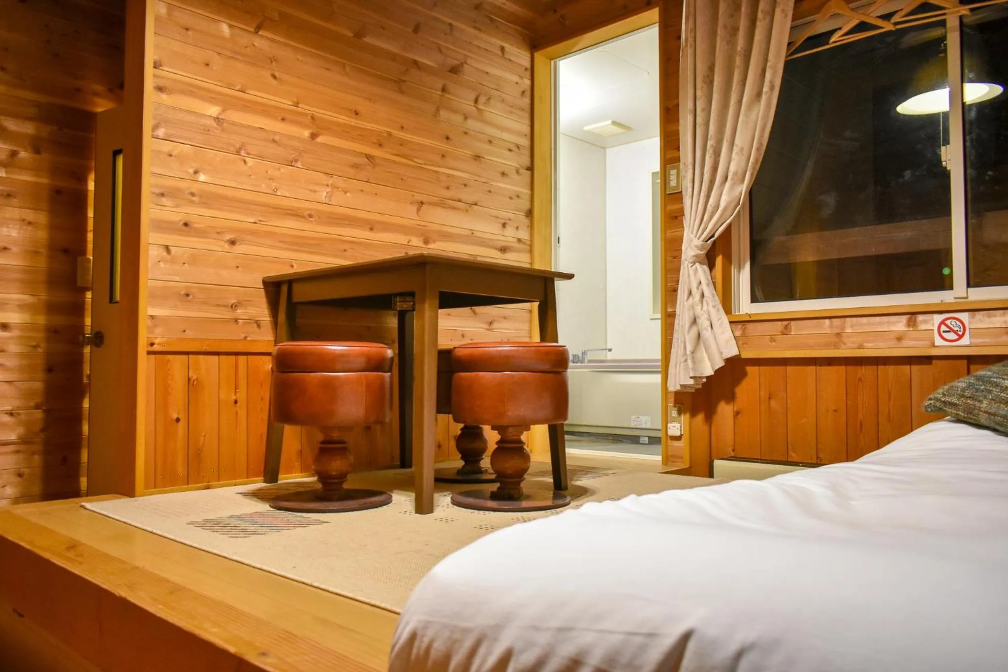 Bed in Kizuna Lodge & BBQ Centre