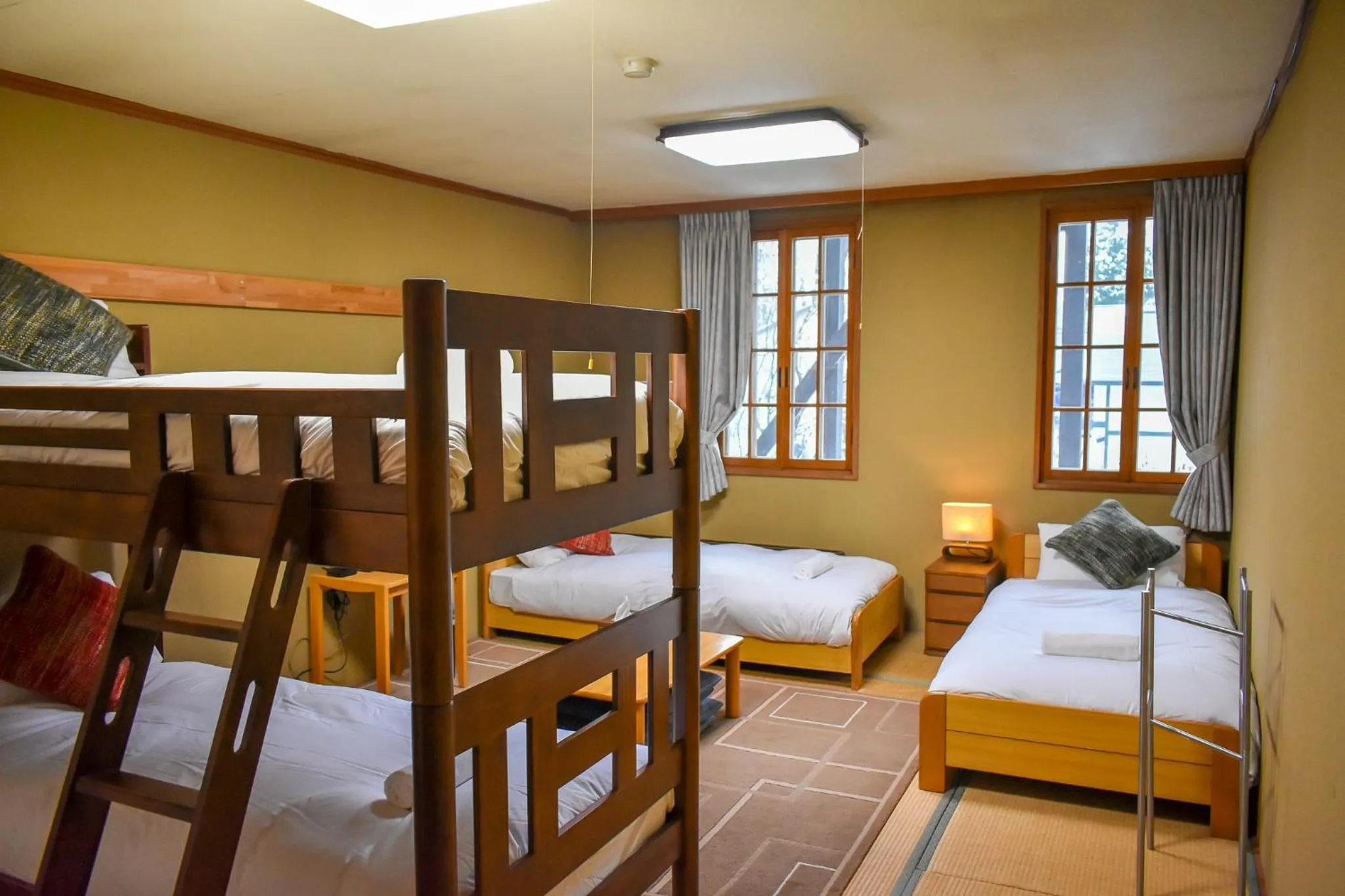 Bed in Kizuna Lodge & BBQ Centre