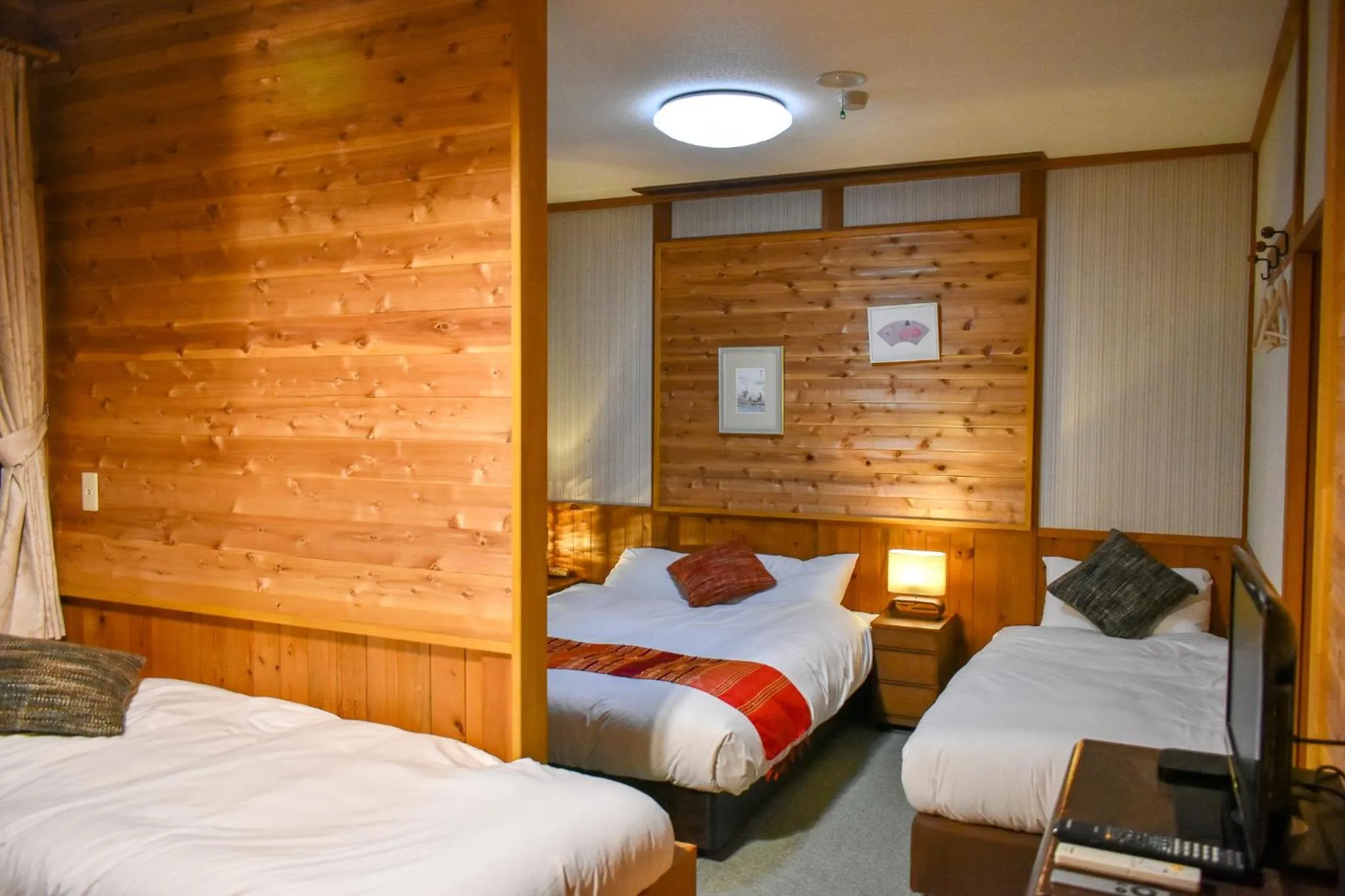 Bed in Kizuna Lodge & BBQ Centre