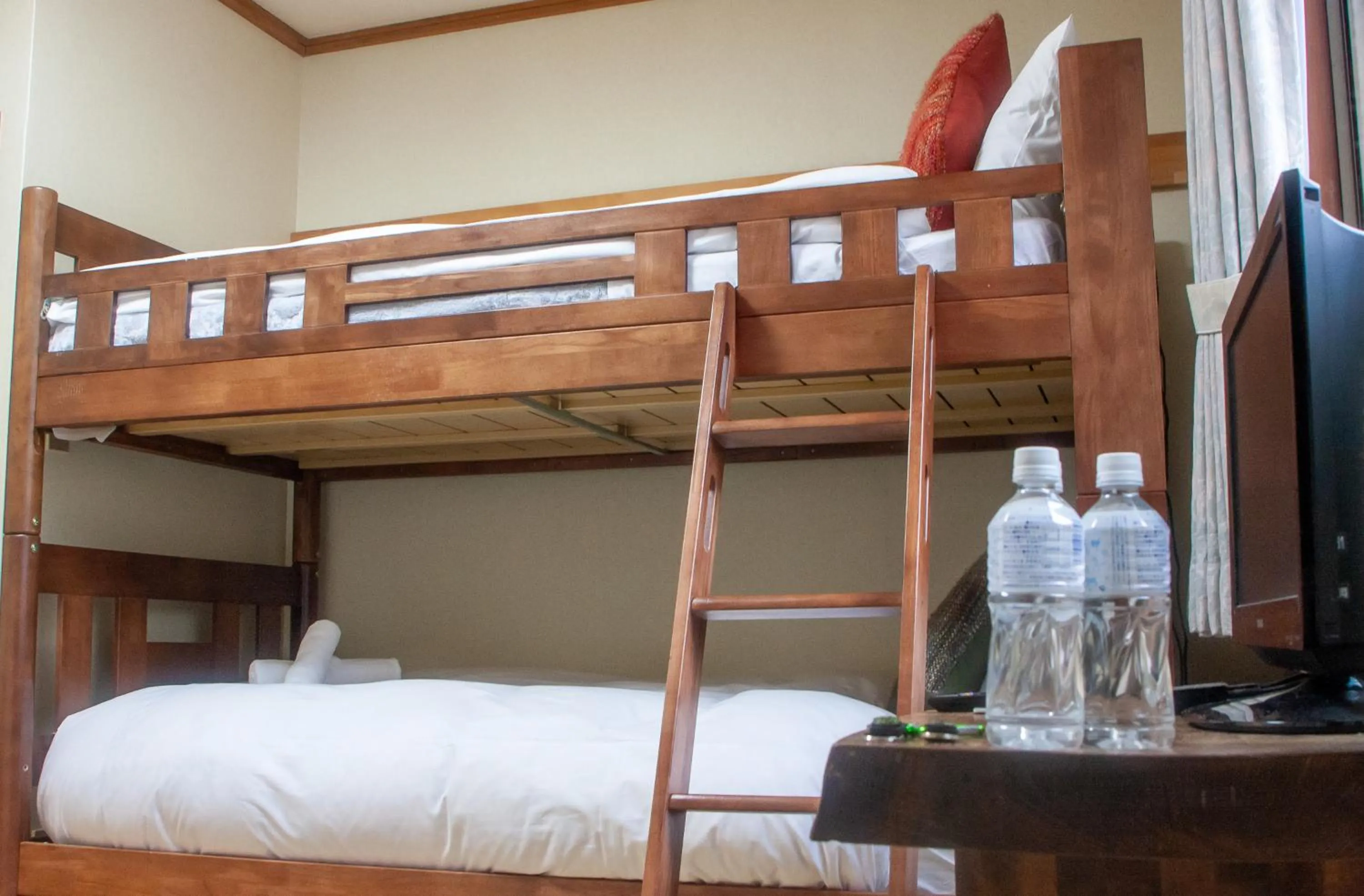 Bed in Kizuna Lodge & BBQ Centre