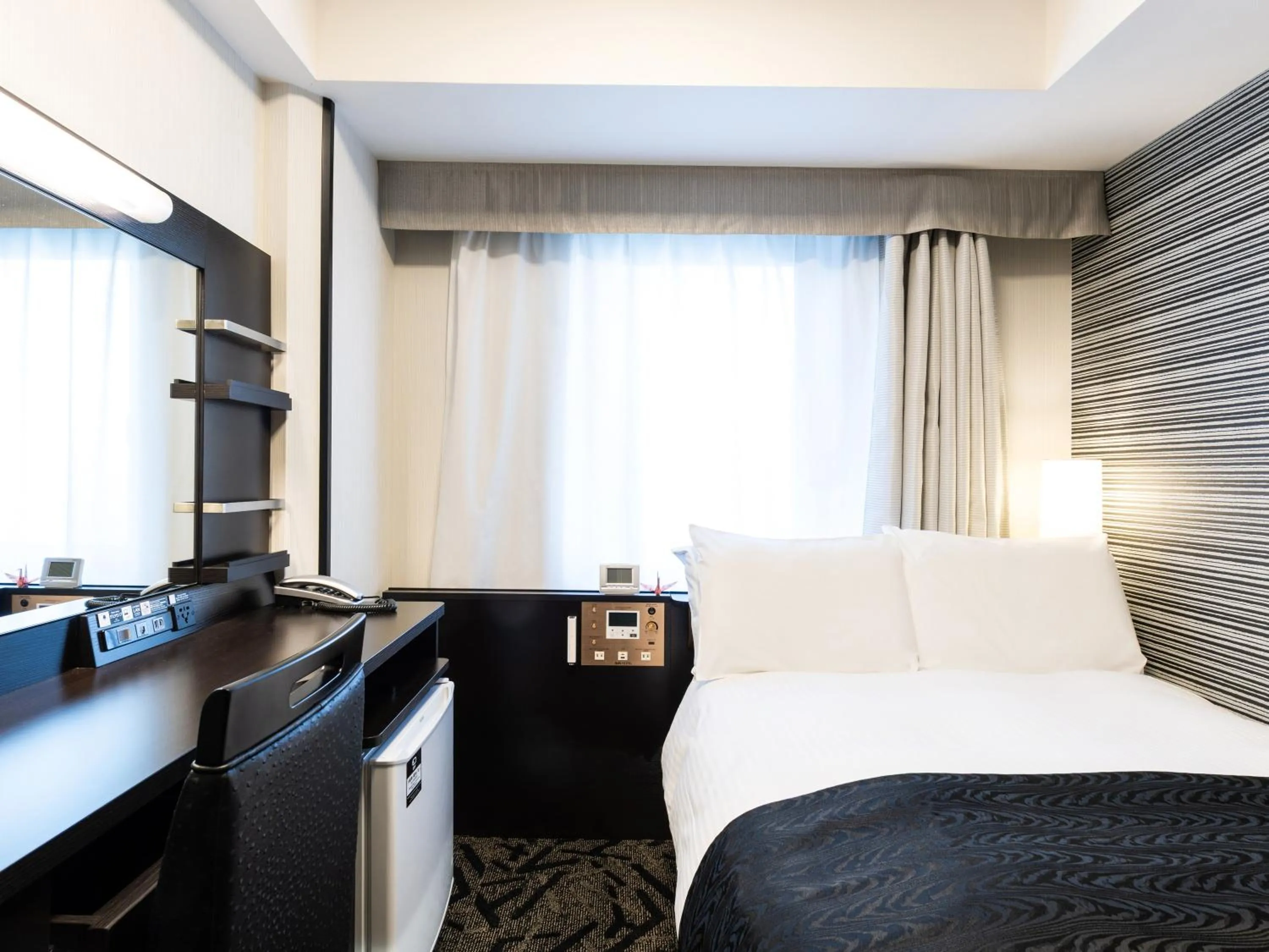 Photo of the whole room, Bed in APA Hotel Shibuya Dogenzakaue