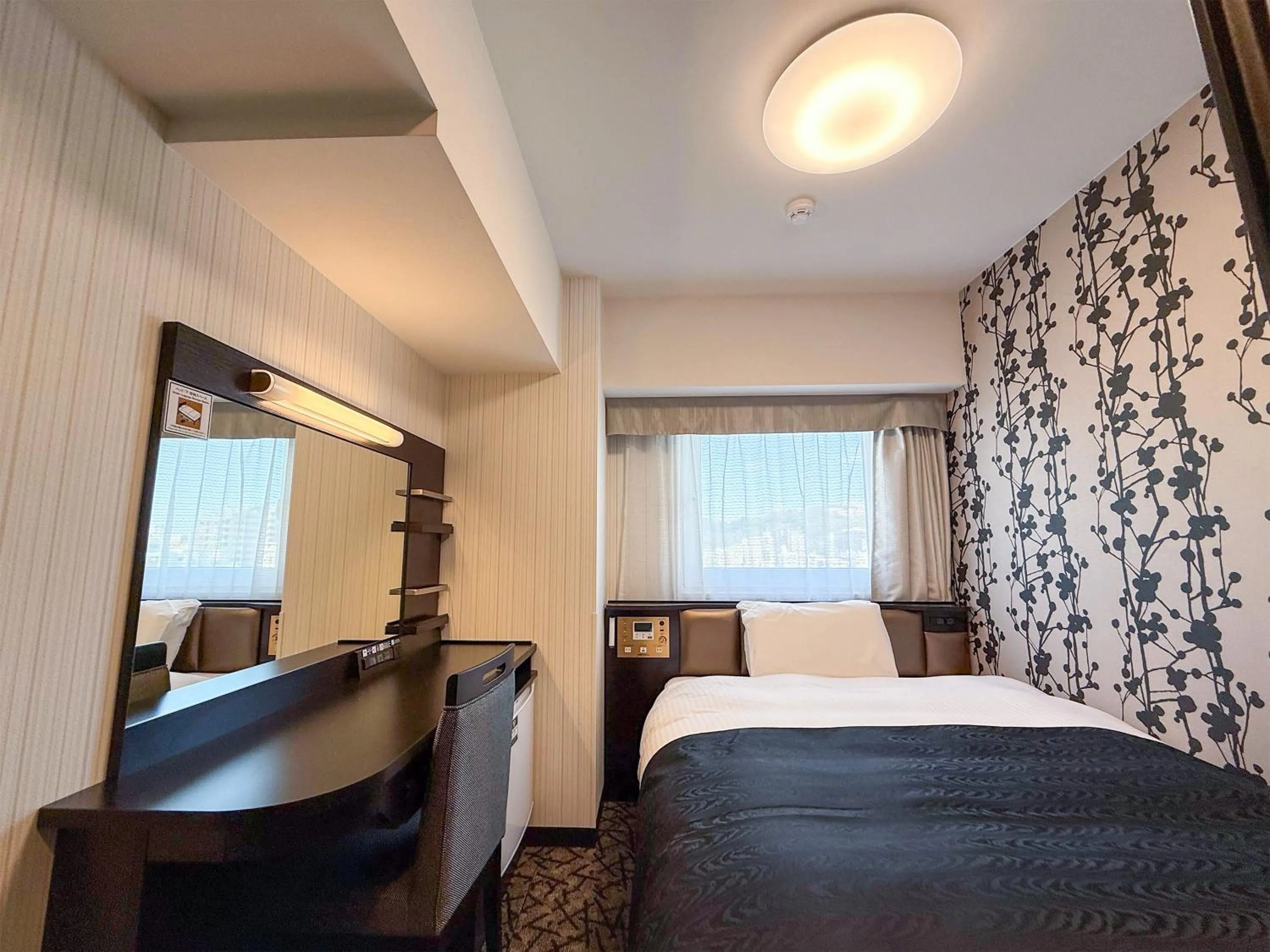 Photo of the whole room, Bed in APA Hotel Shibuya Dogenzakaue