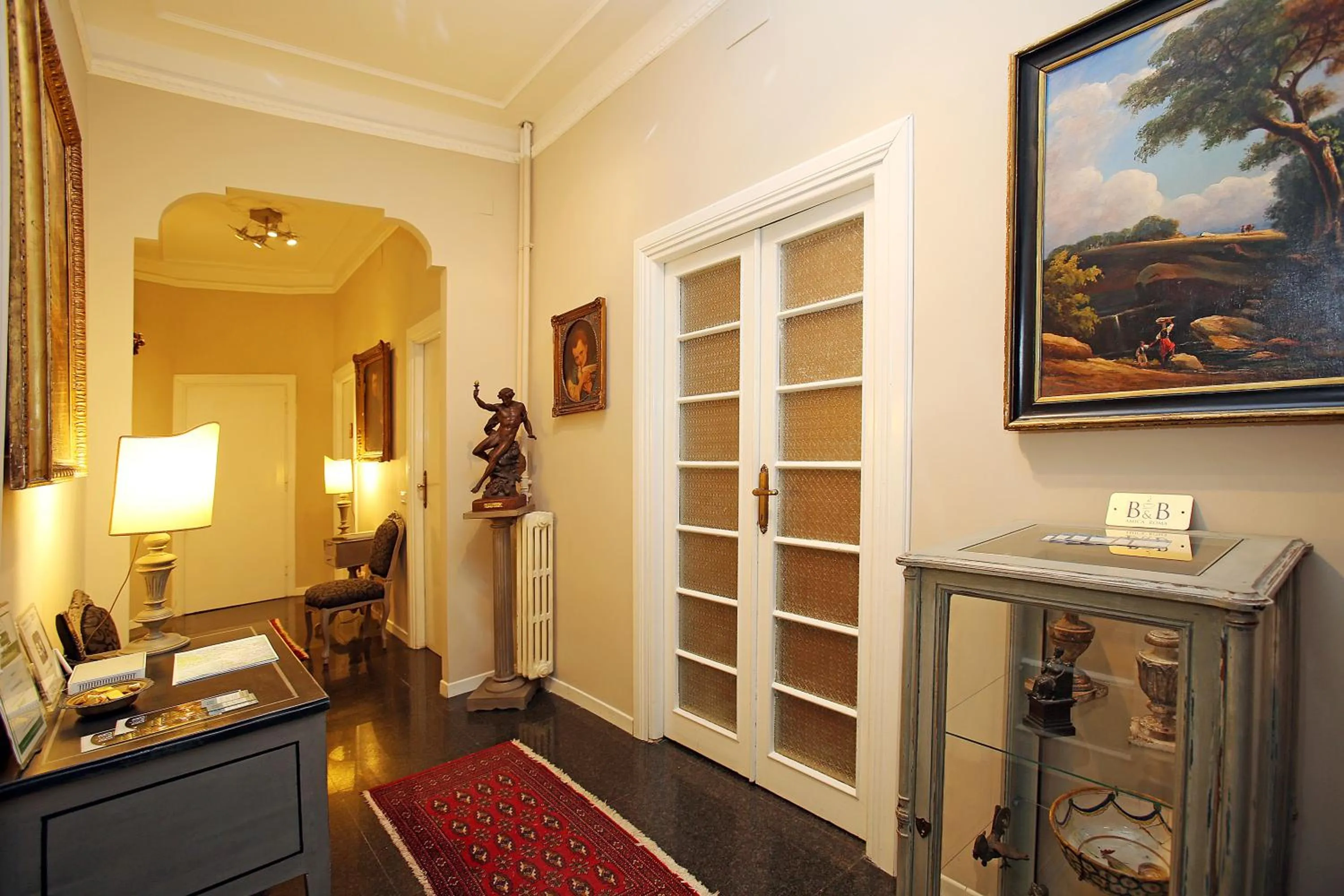 Lobby or reception in Amica Roma Guest House