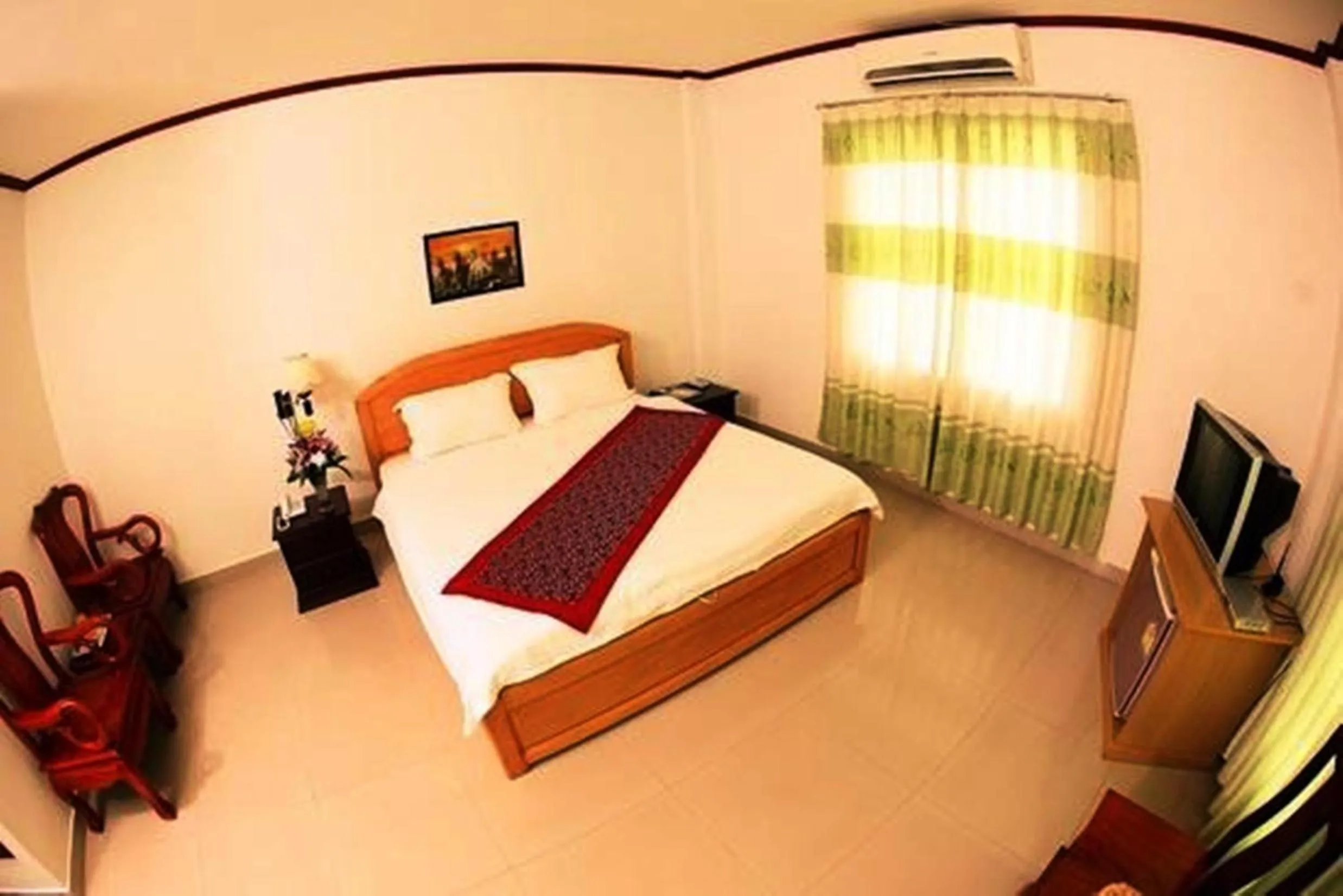 Bed in Douangpraseuth Hotel