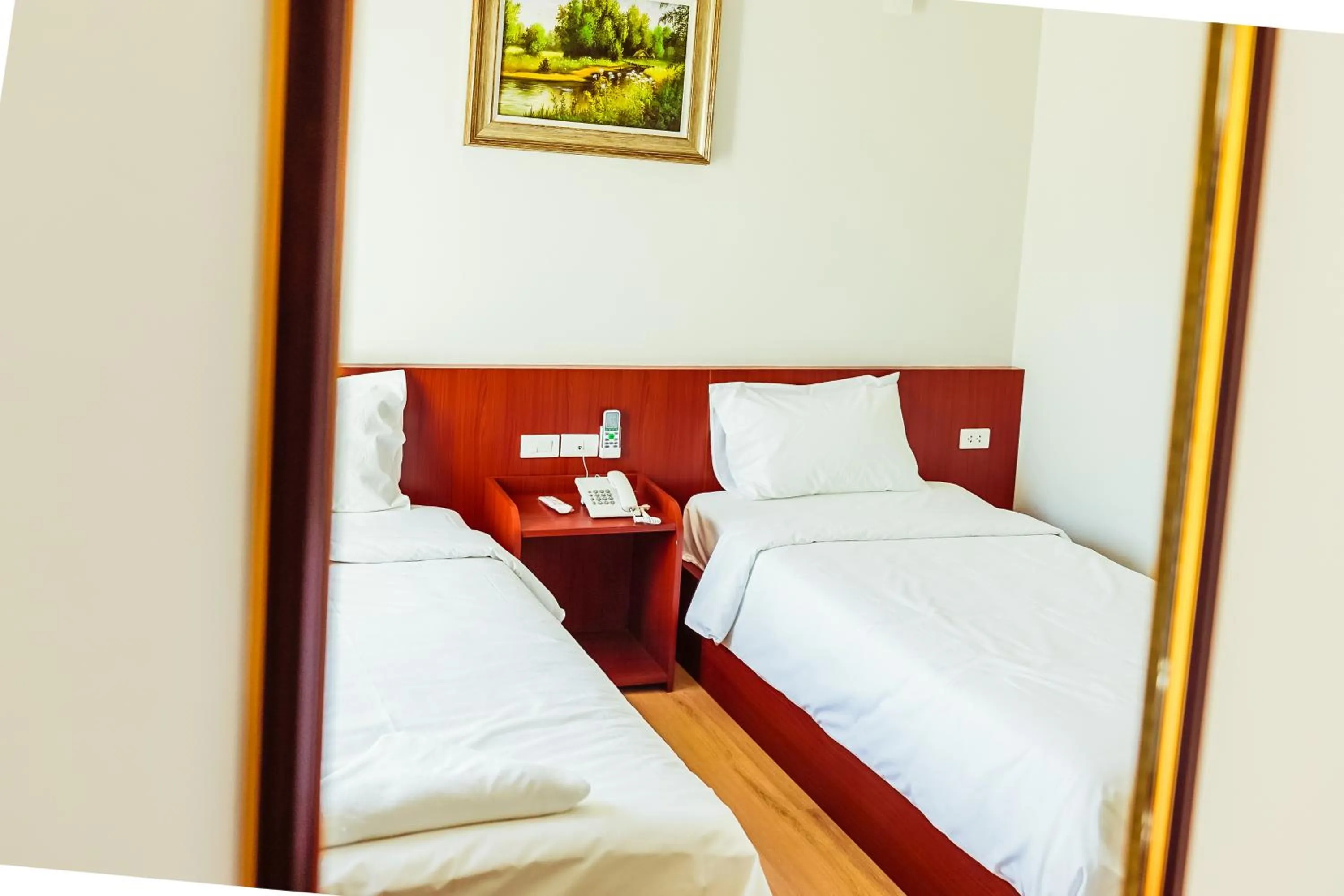 Bed in Douangpraseuth Hotel