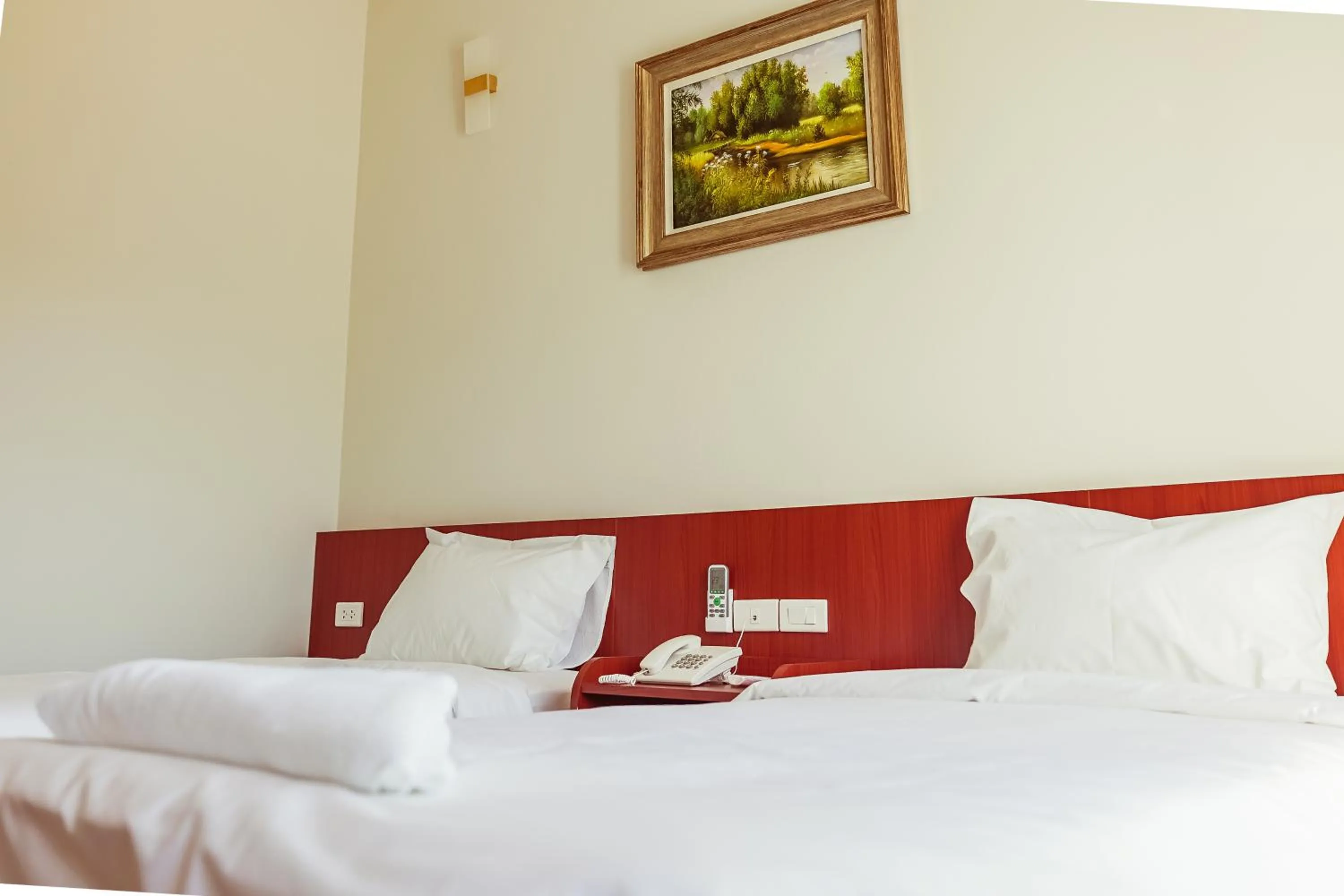 Bed in Douangpraseuth Hotel