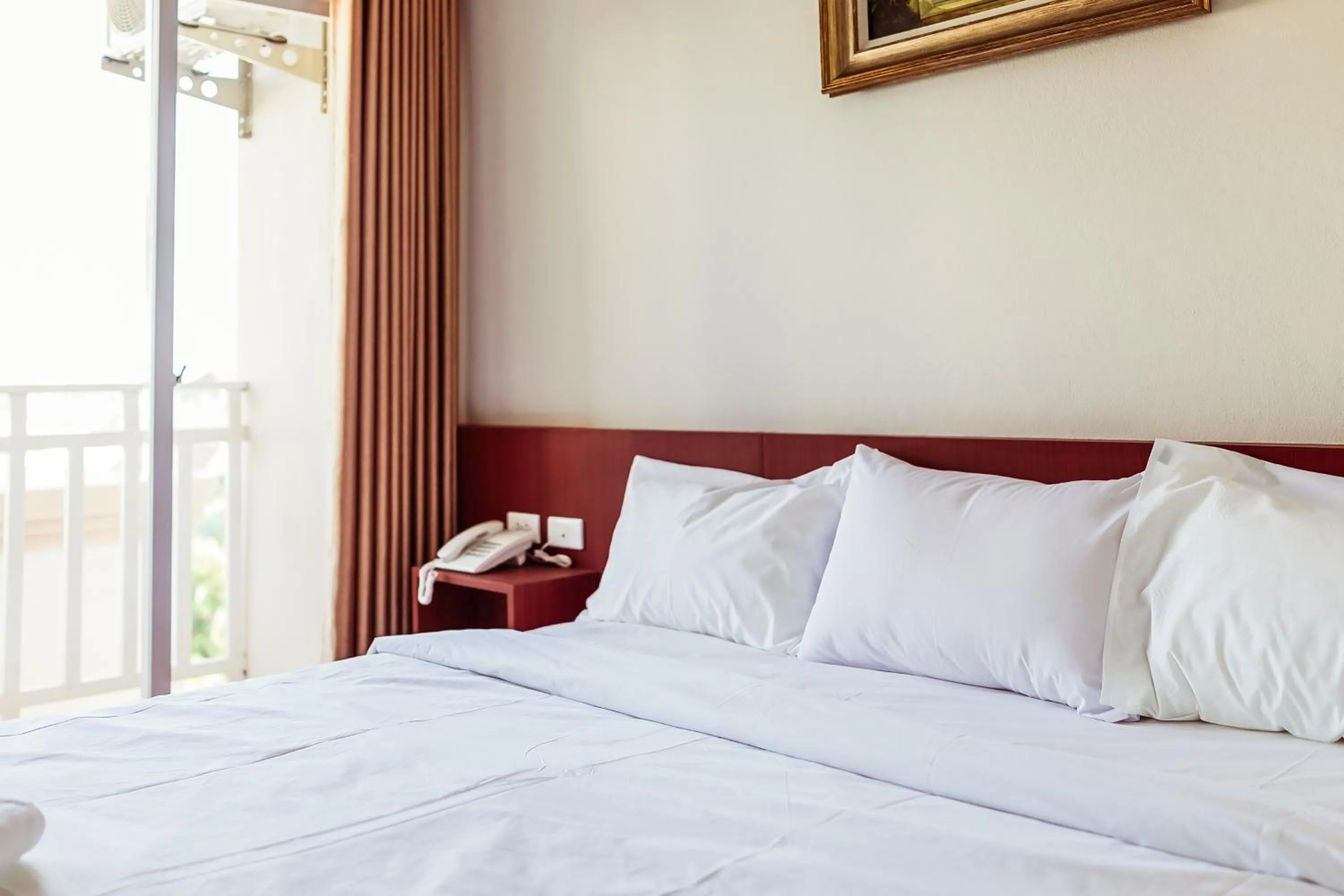 Bed in Douangpraseuth Hotel