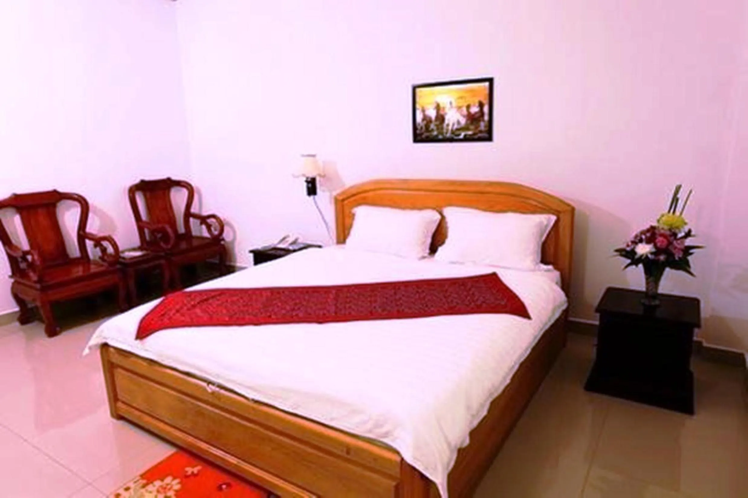 Bed in Douangpraseuth Hotel