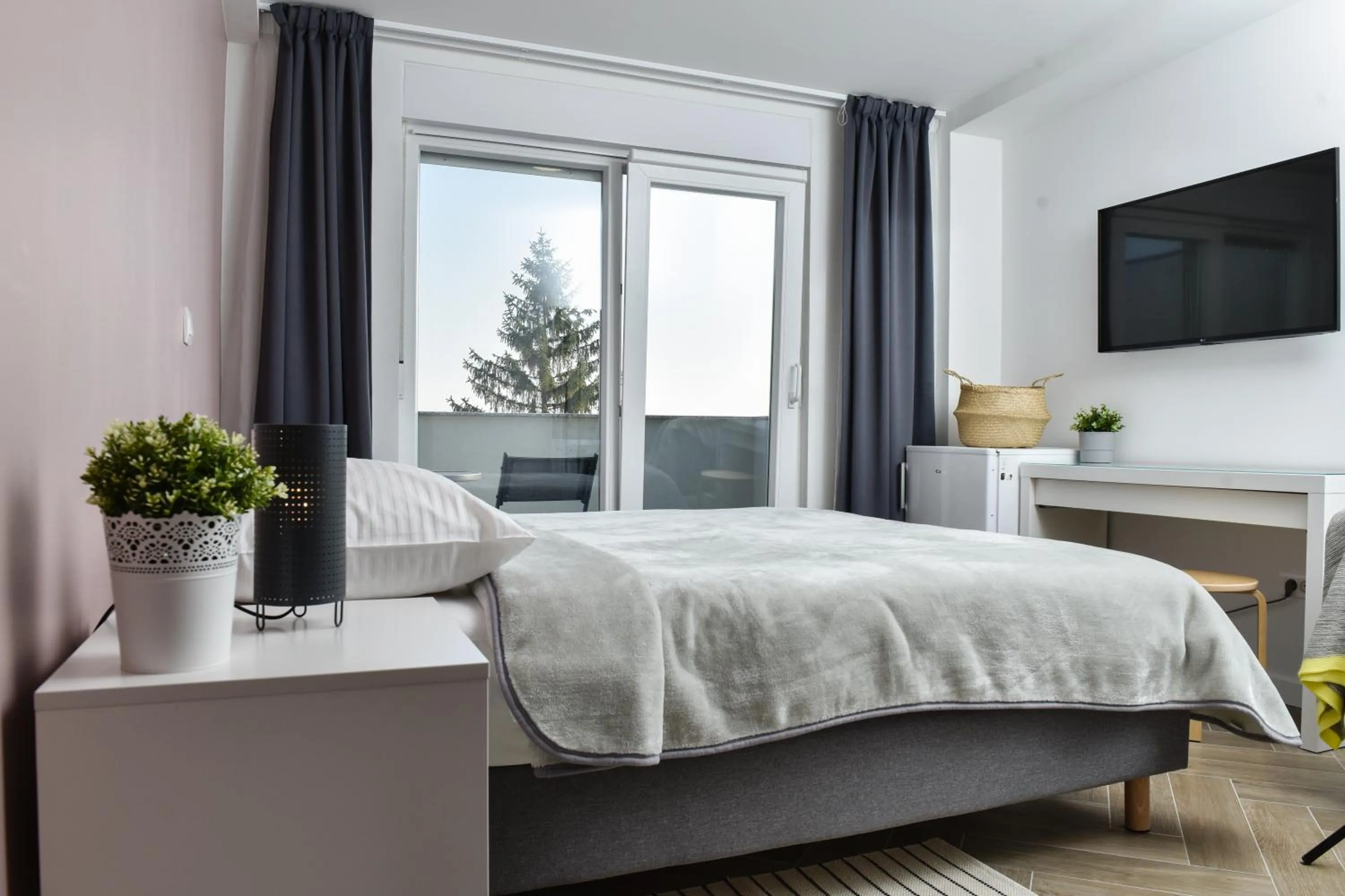 TV and multimedia, Bed in Rooms at Zajčeva 34